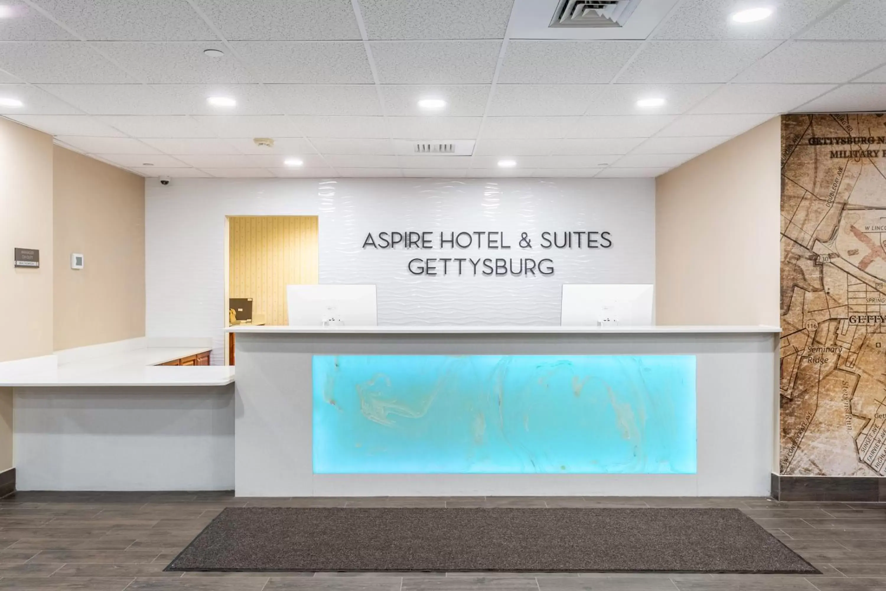 Lobby or reception in Aspire Hotel and Suites