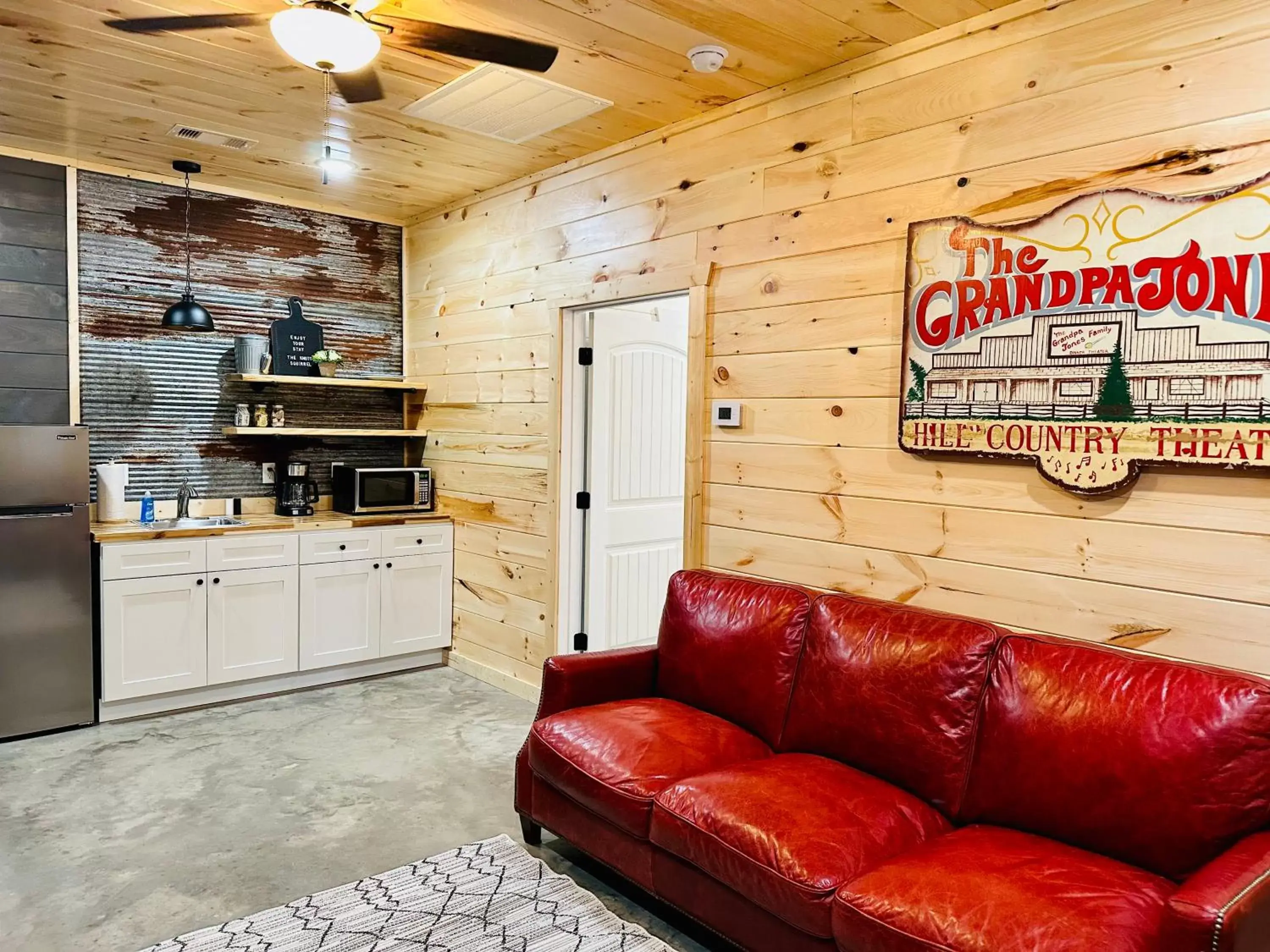 Kitchen or kitchenette in Knotty Squirrel Cabins