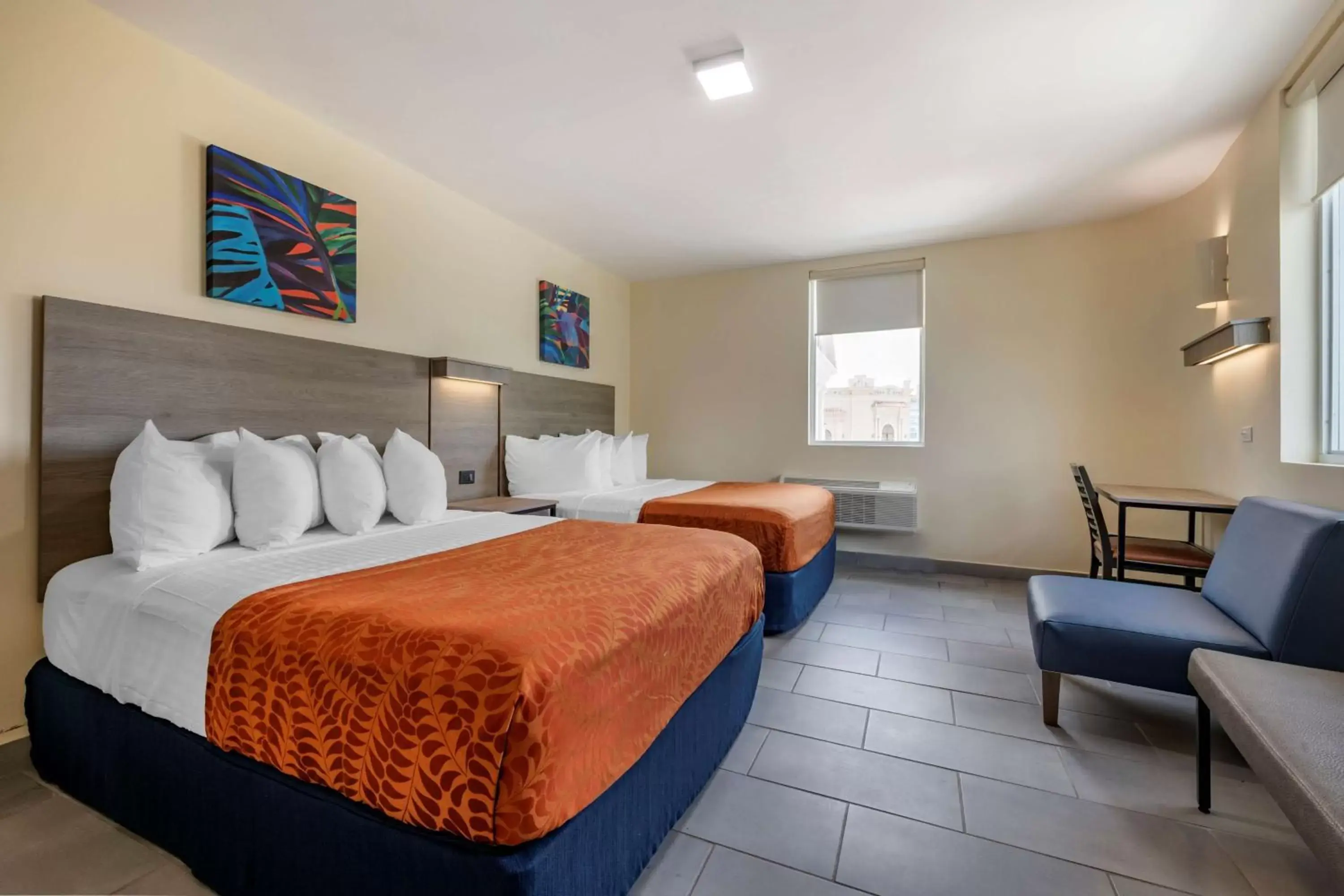 Bedroom, Bed in Mayaguez Plaza Hotel; SureStay Collection by Best Western