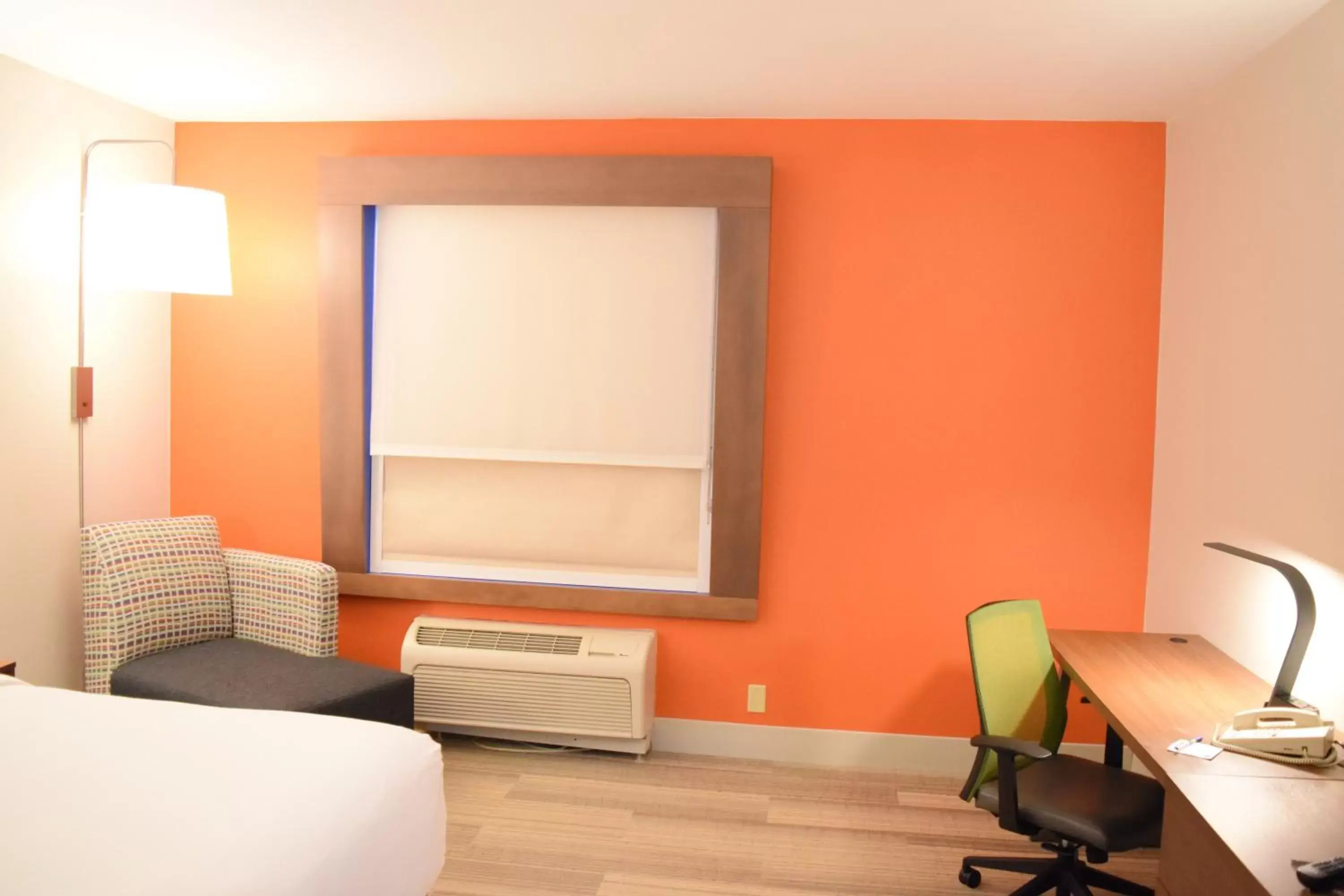 Bedroom, Seating Area in Holiday Inn Express & Suites Pensacola West I-10, an IHG Hotel