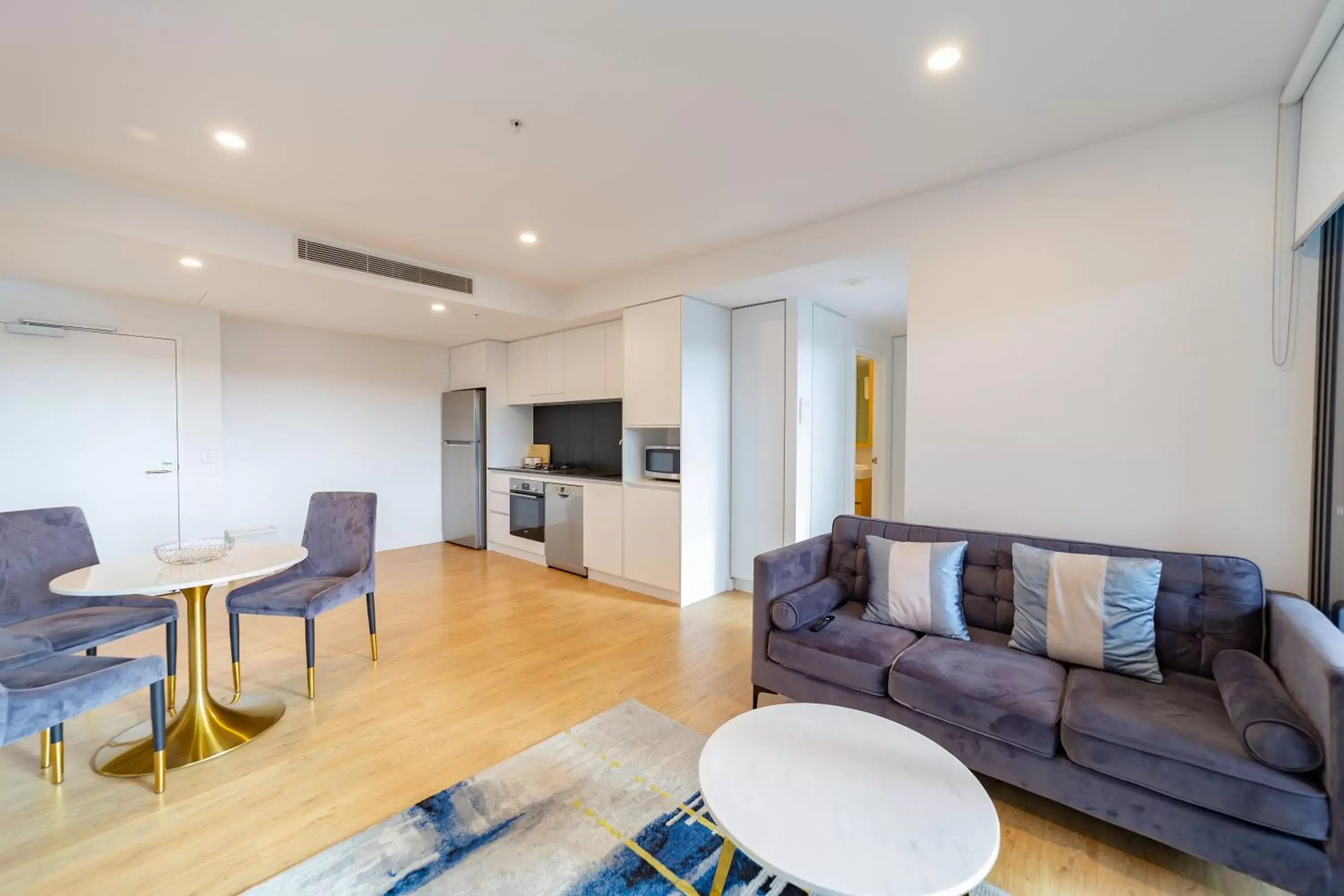 Living room, Seating Area in Brisbane One Apartments by CLLIX