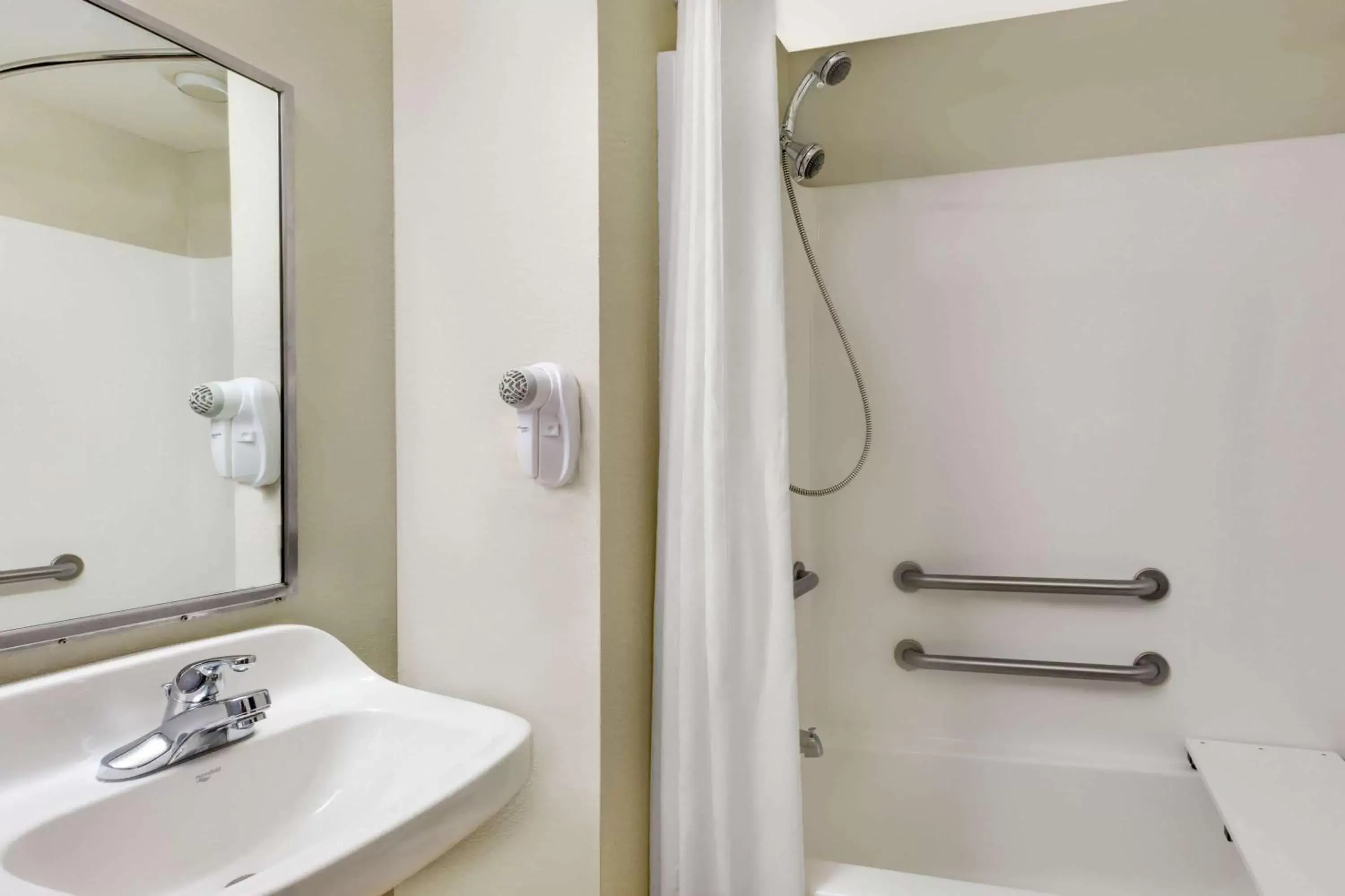 Bathroom in Microtel Inn & Suites by Wyndham Tuscaloosa