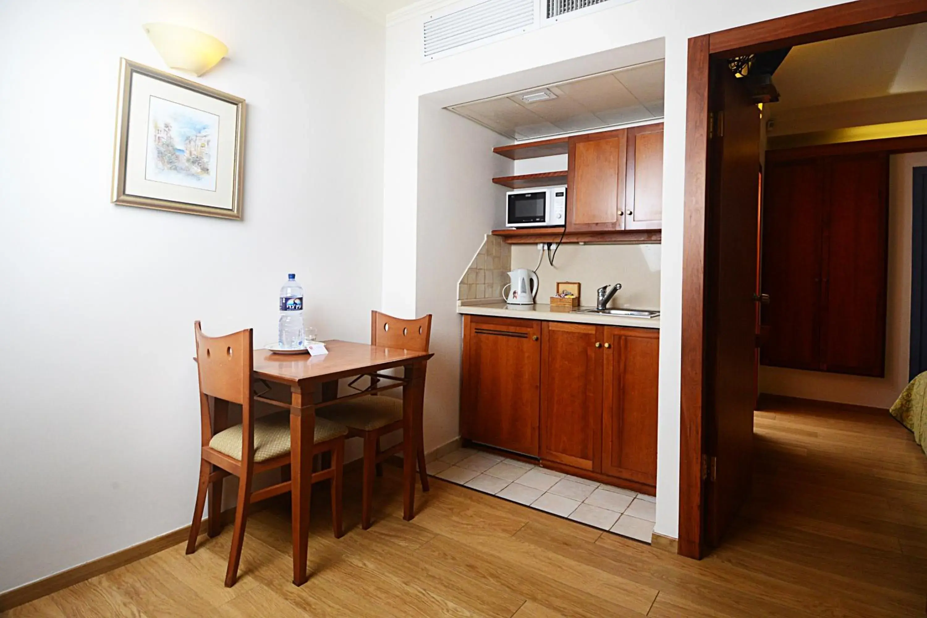 Photo of the whole room, Kitchen/Kitchenette in Abratel Suites Hotel