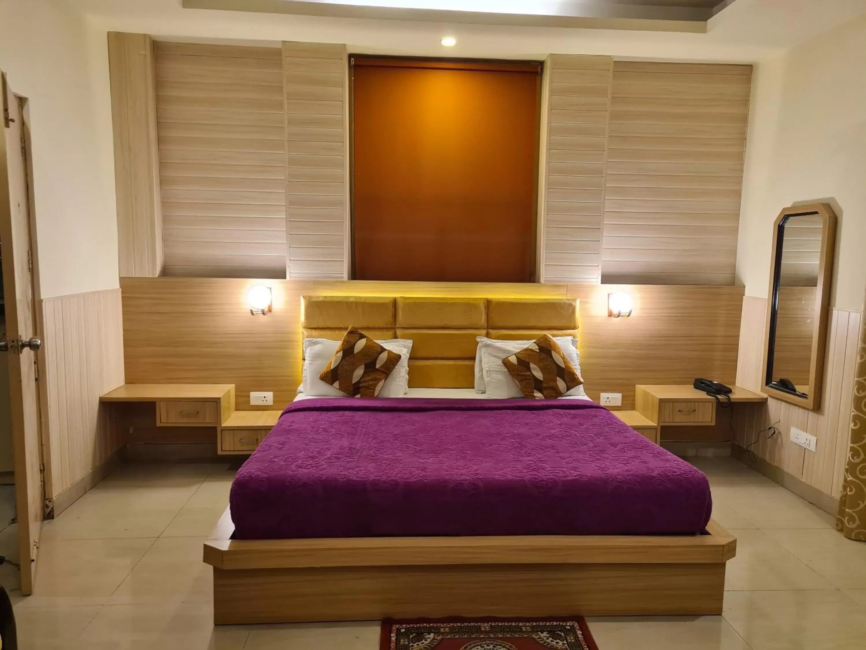 Photo of the whole room, Bed in Hotel Rajpur Heights