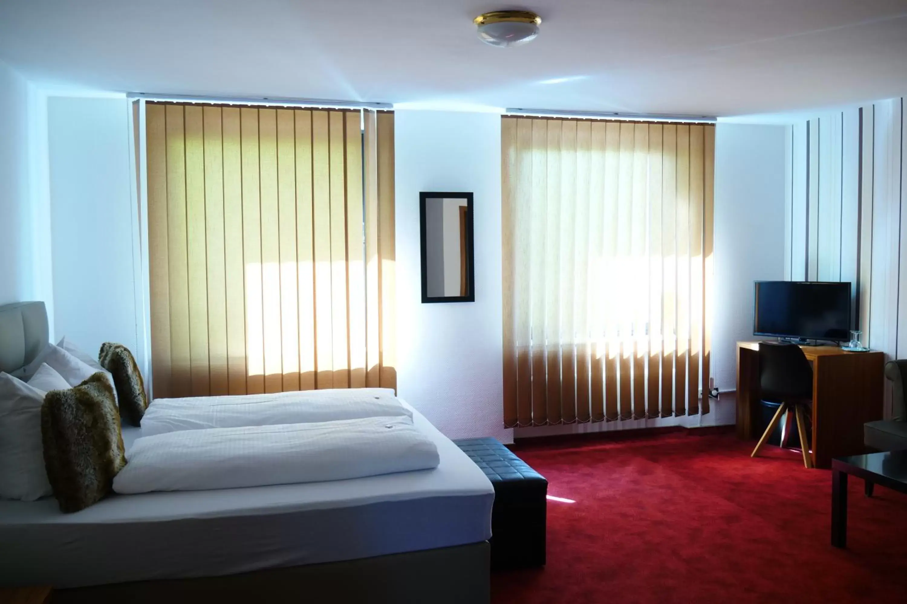 Photo of the whole room, Bed in Parkhotel Bergheim