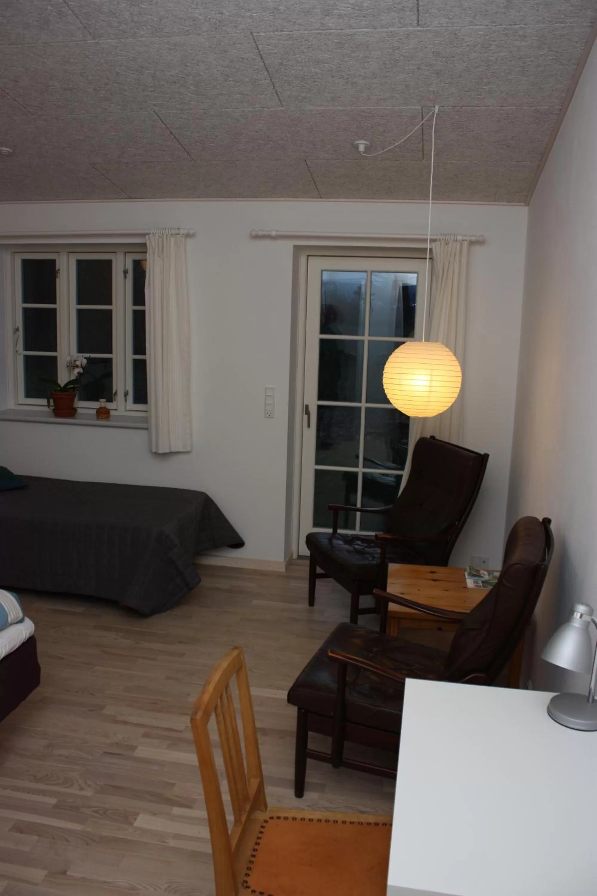 Bed in Holmehuset Bed & Breakfast