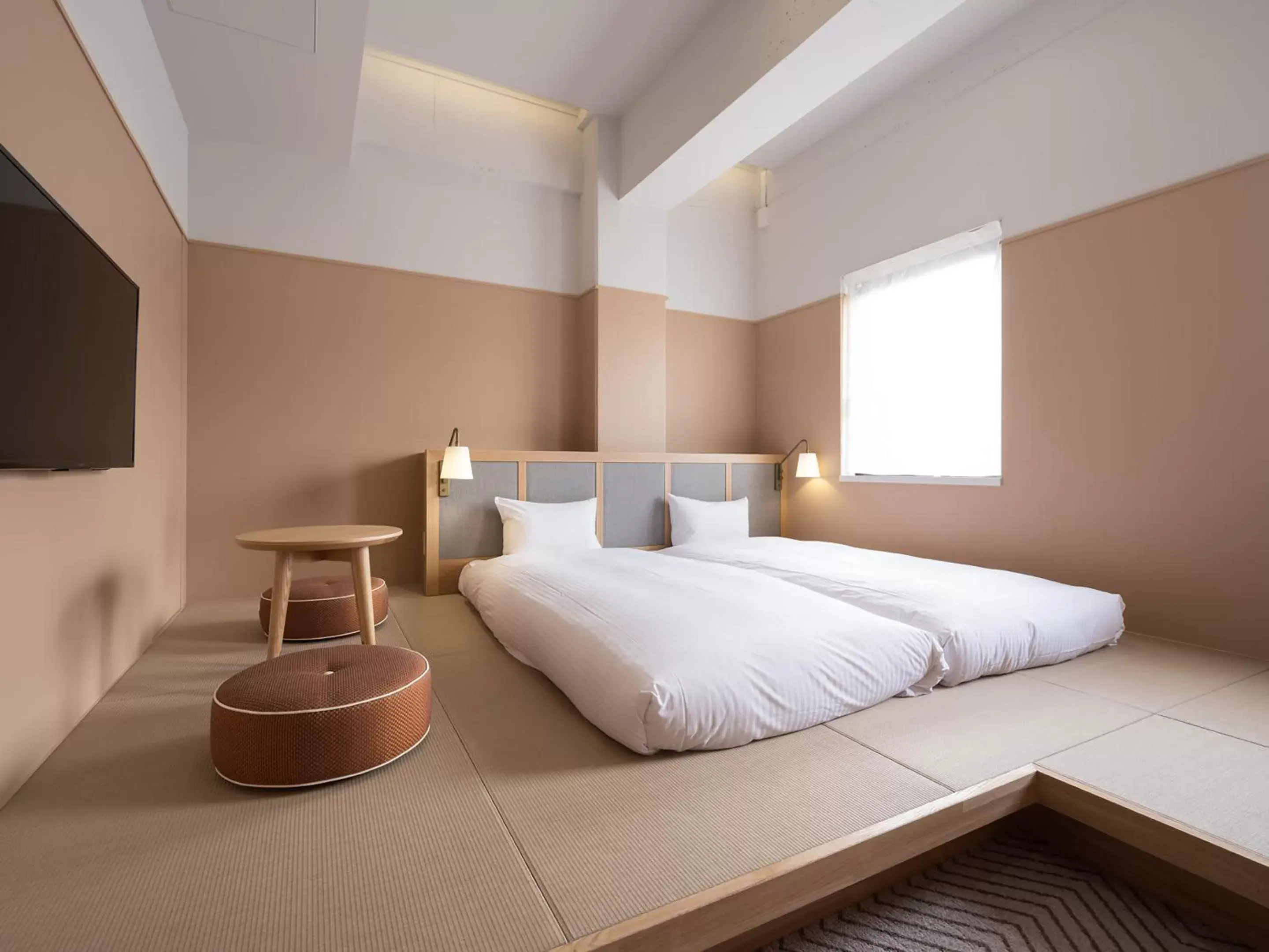 Photo of the whole room, Bed in RAKURO Kyoto by THE SHARE HOTELS