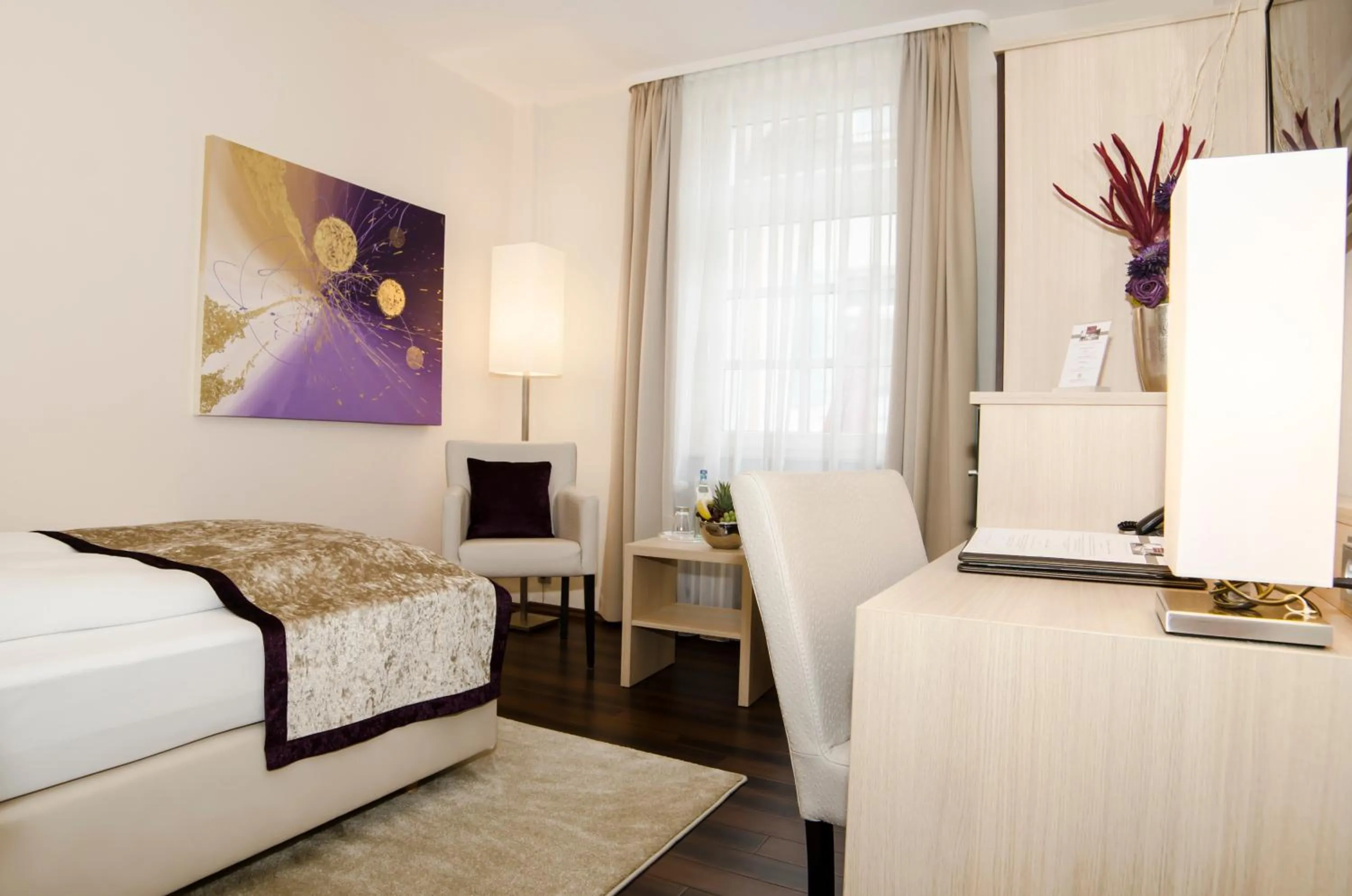 Photo of the whole room in Hotel Merkur - Superior