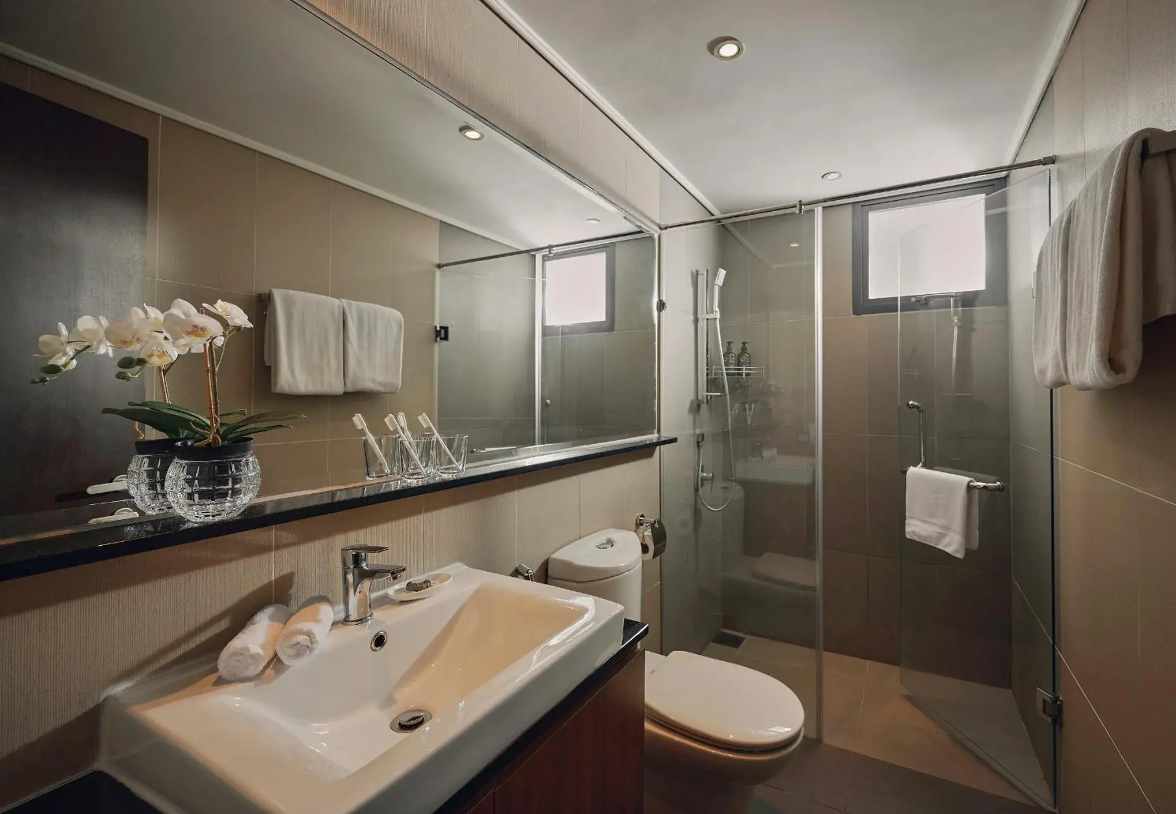 Shower, Bathroom in TRILLION SUITES by SLG