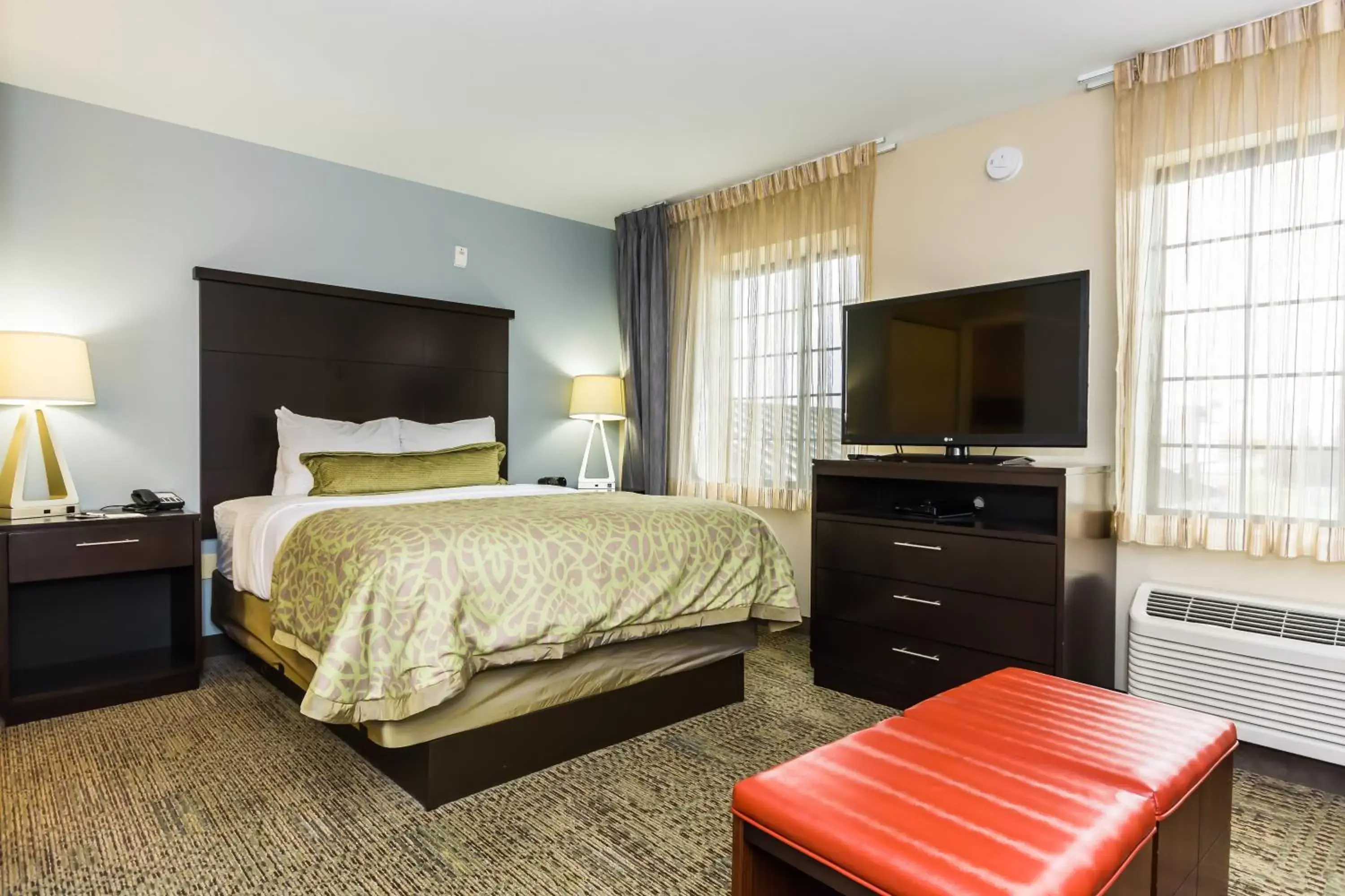 Photo of the whole room, Bed in Staybridge Suites Grand Forks, an IHG Hotel