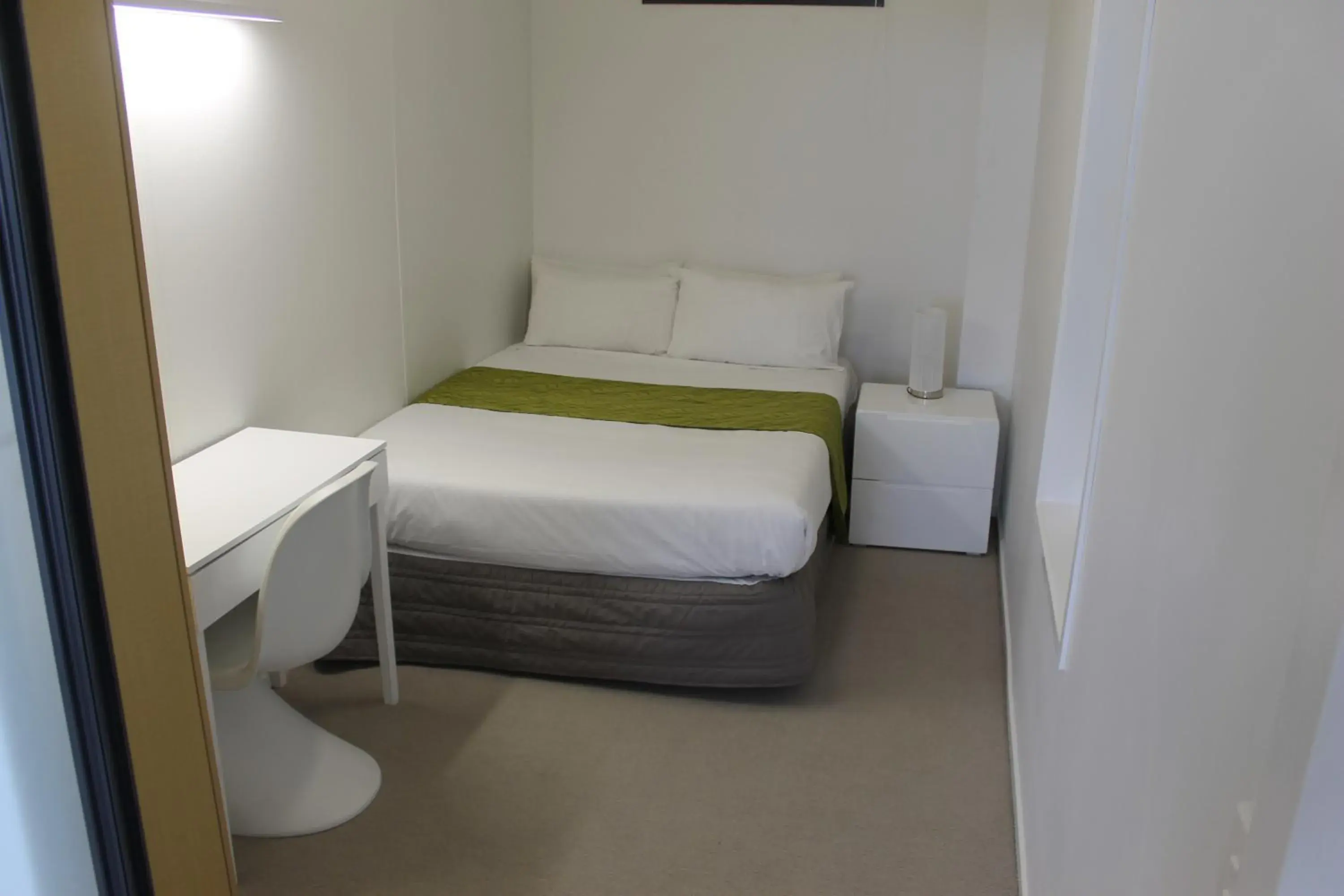 Photo of the whole room, Bed in MCentral Apartments Manukau