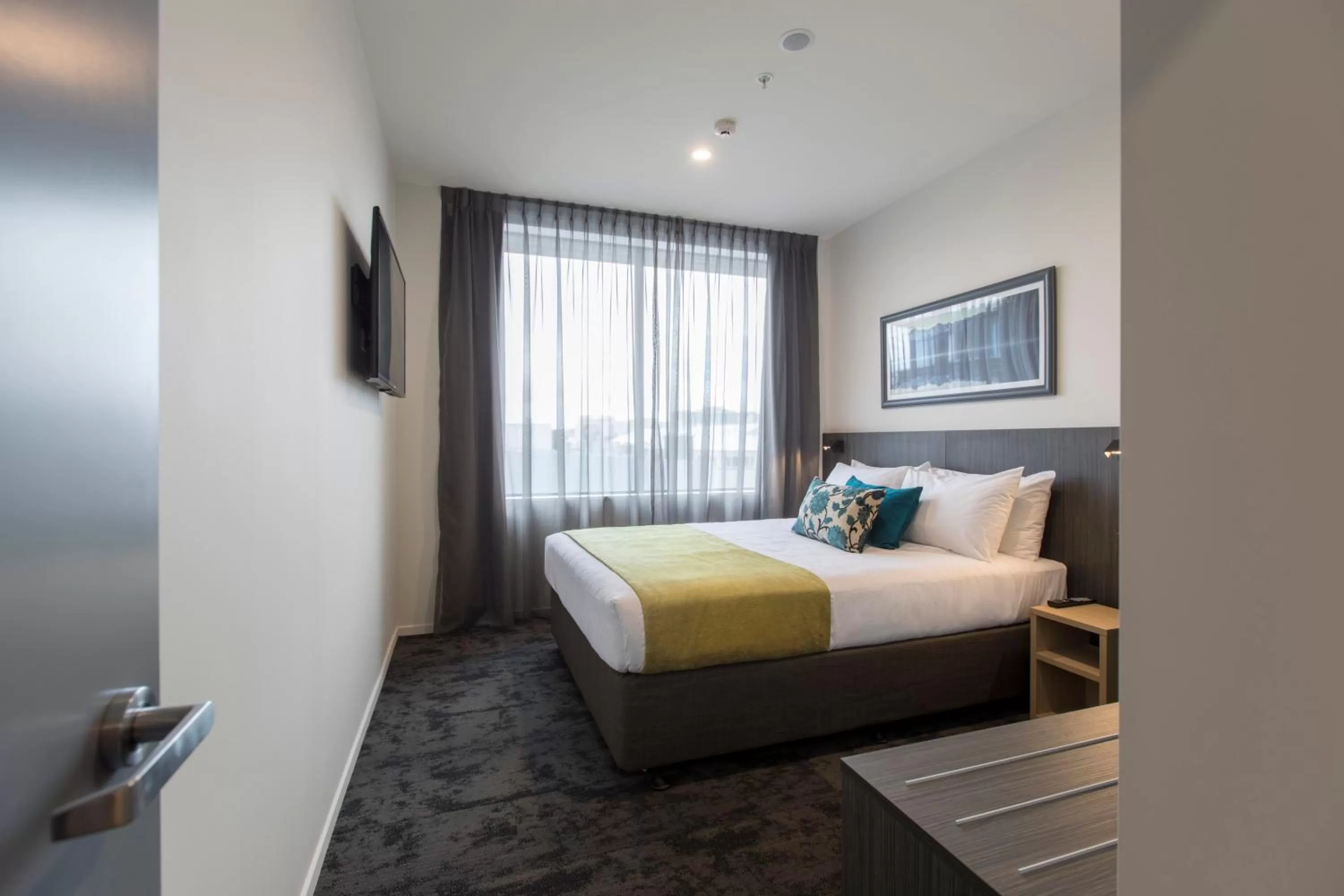 Decorative detail, Bed in Quest on Manchester Serviced Apartments