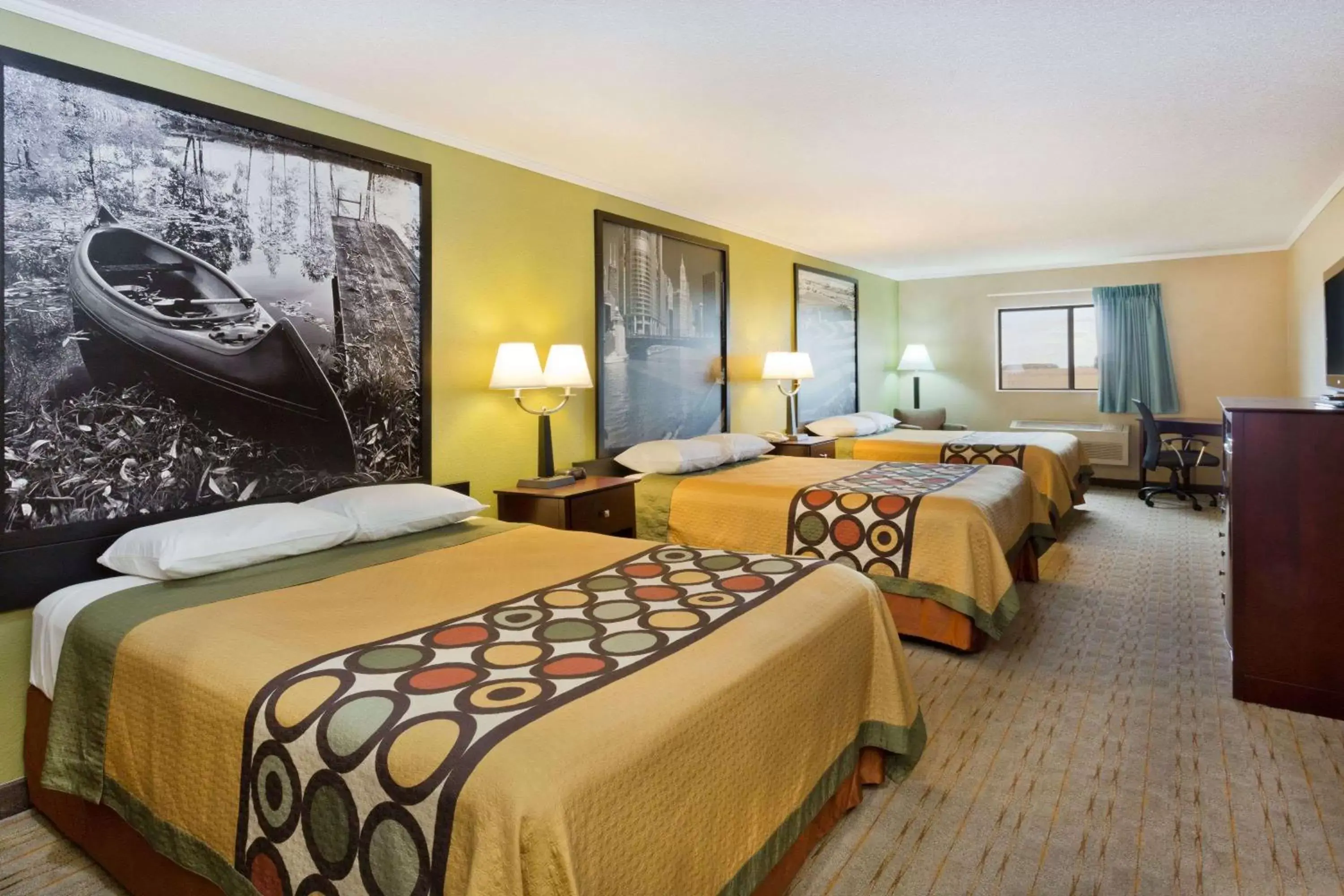 Superior Queen Room with Three Queen Beds - Non-Smoking in Super 8 by Wyndham Rochelle