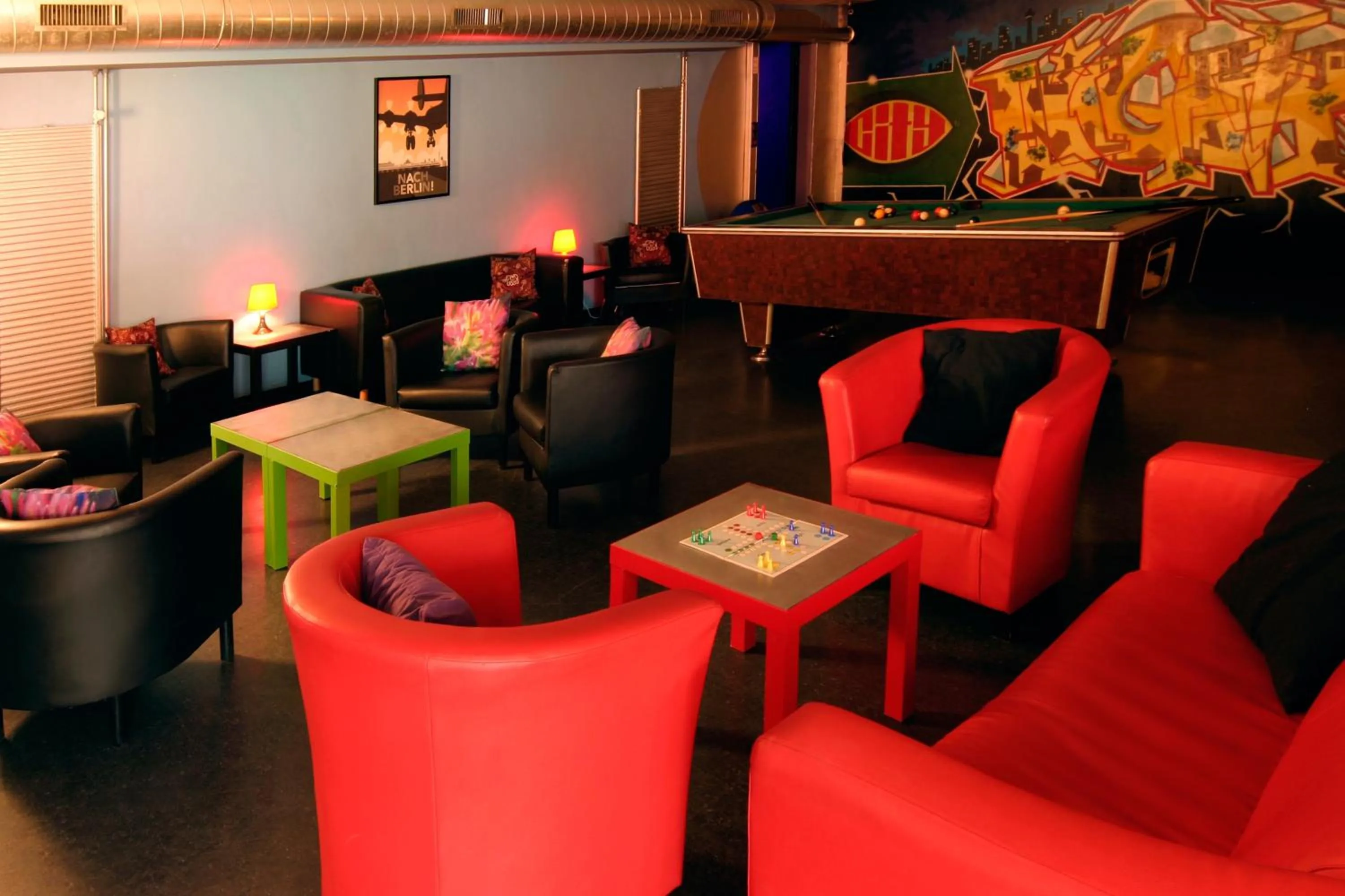 Communal lounge/ TV room in Familienhotel Citylight