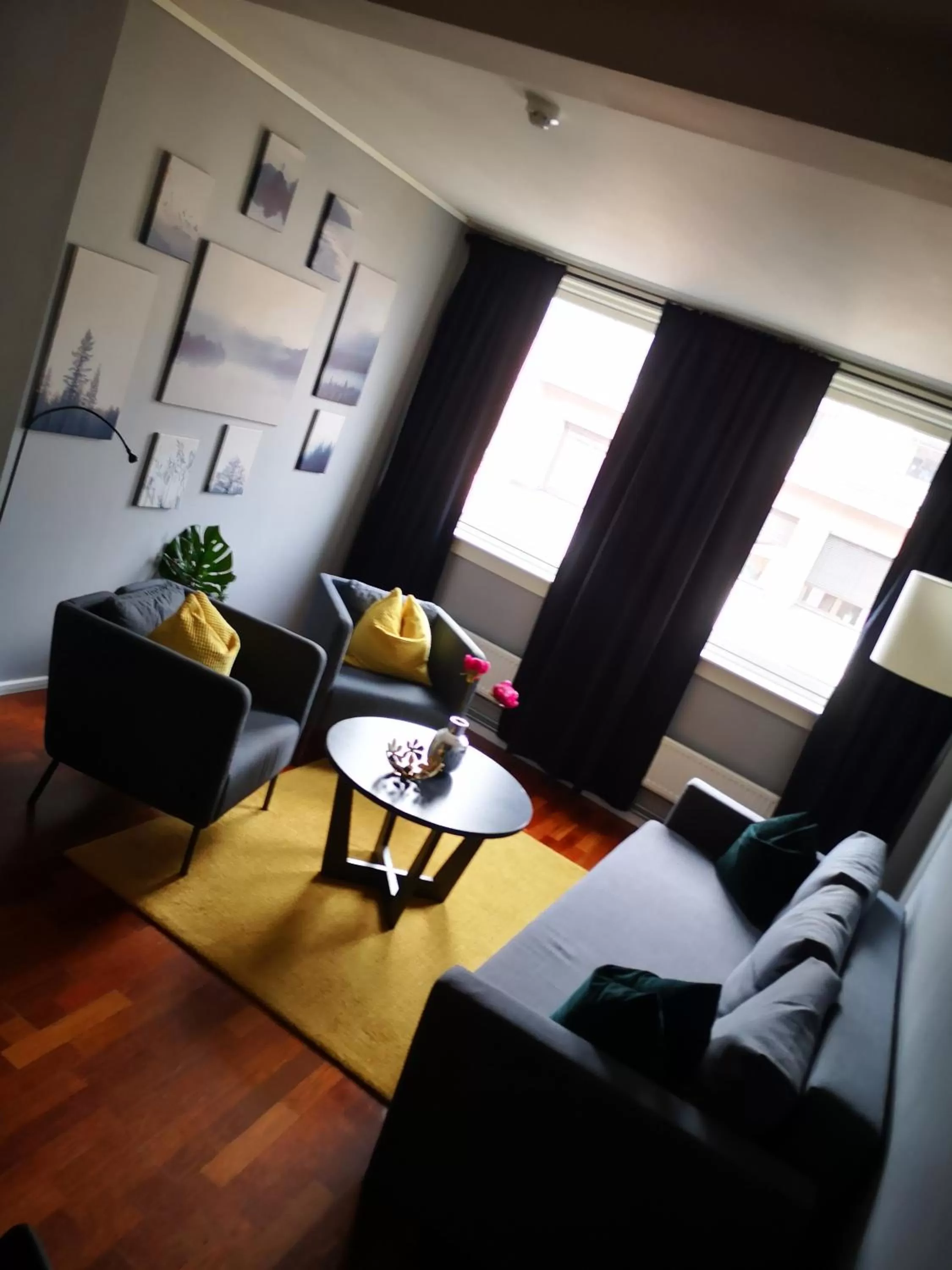 Living room in First Hotel Millennium