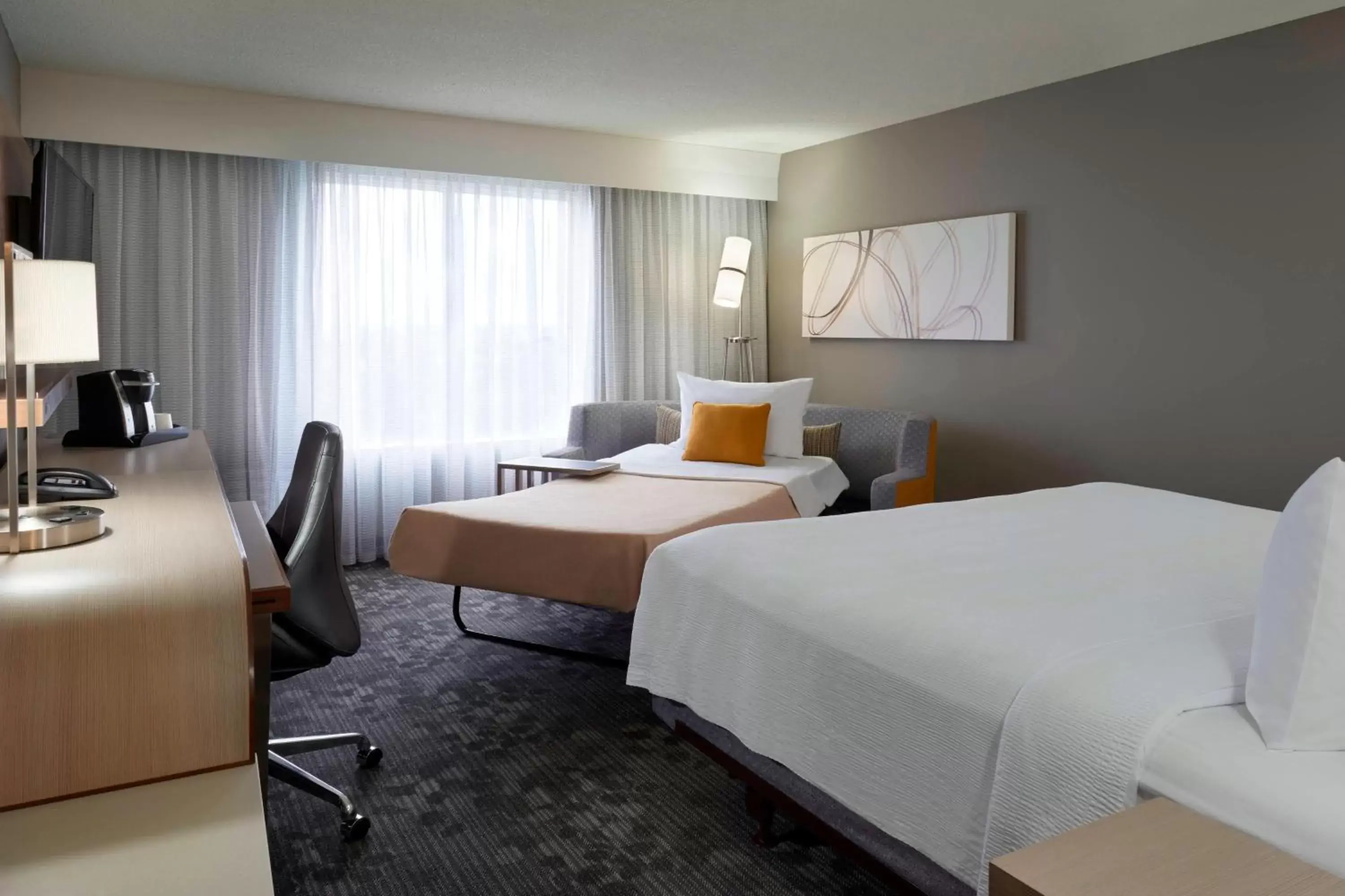 Photo of the whole room in Courtyard by Marriott Toronto Airport