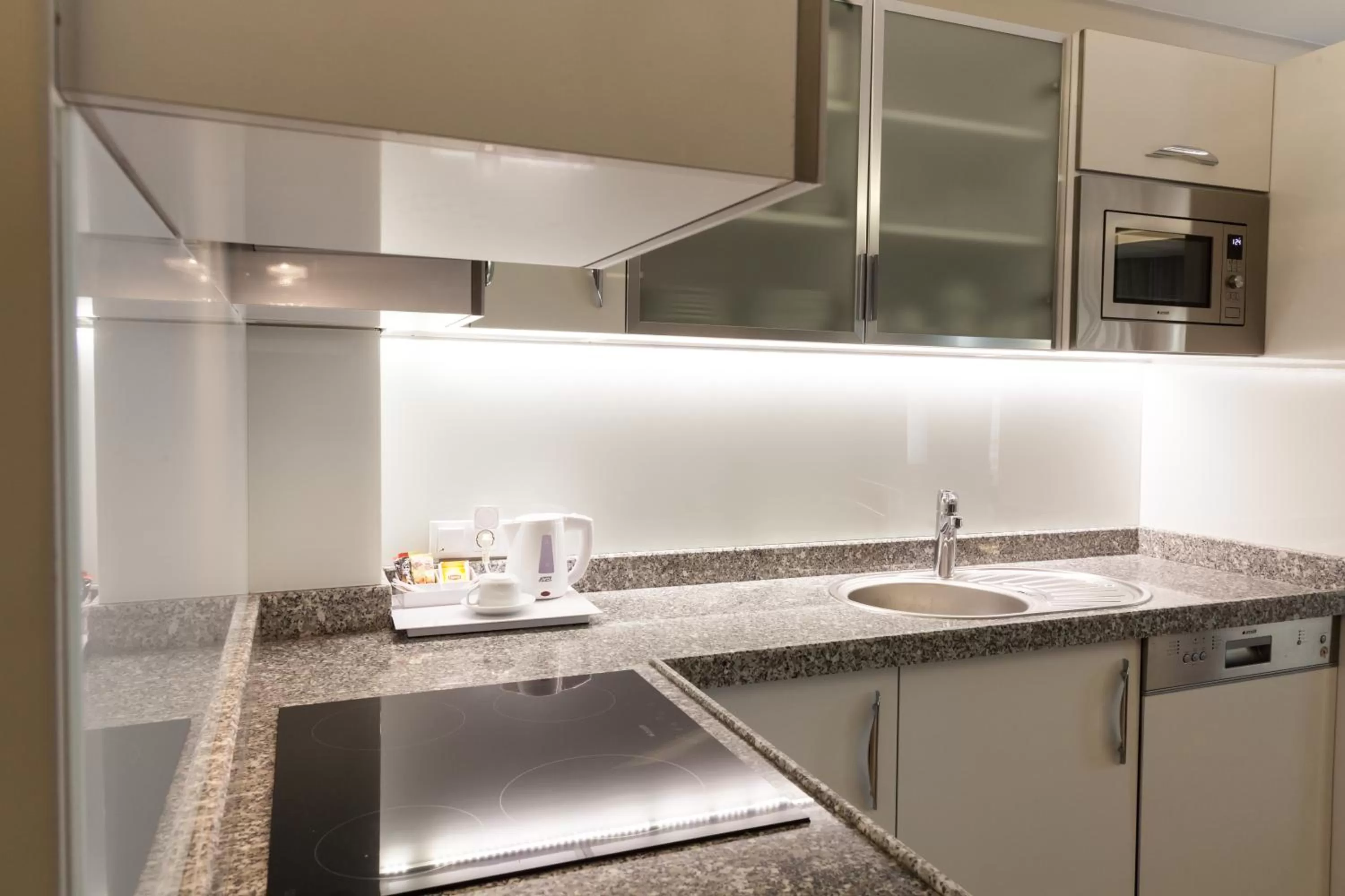 Kitchen or kitchenette in Sun Garden Apart Hotel