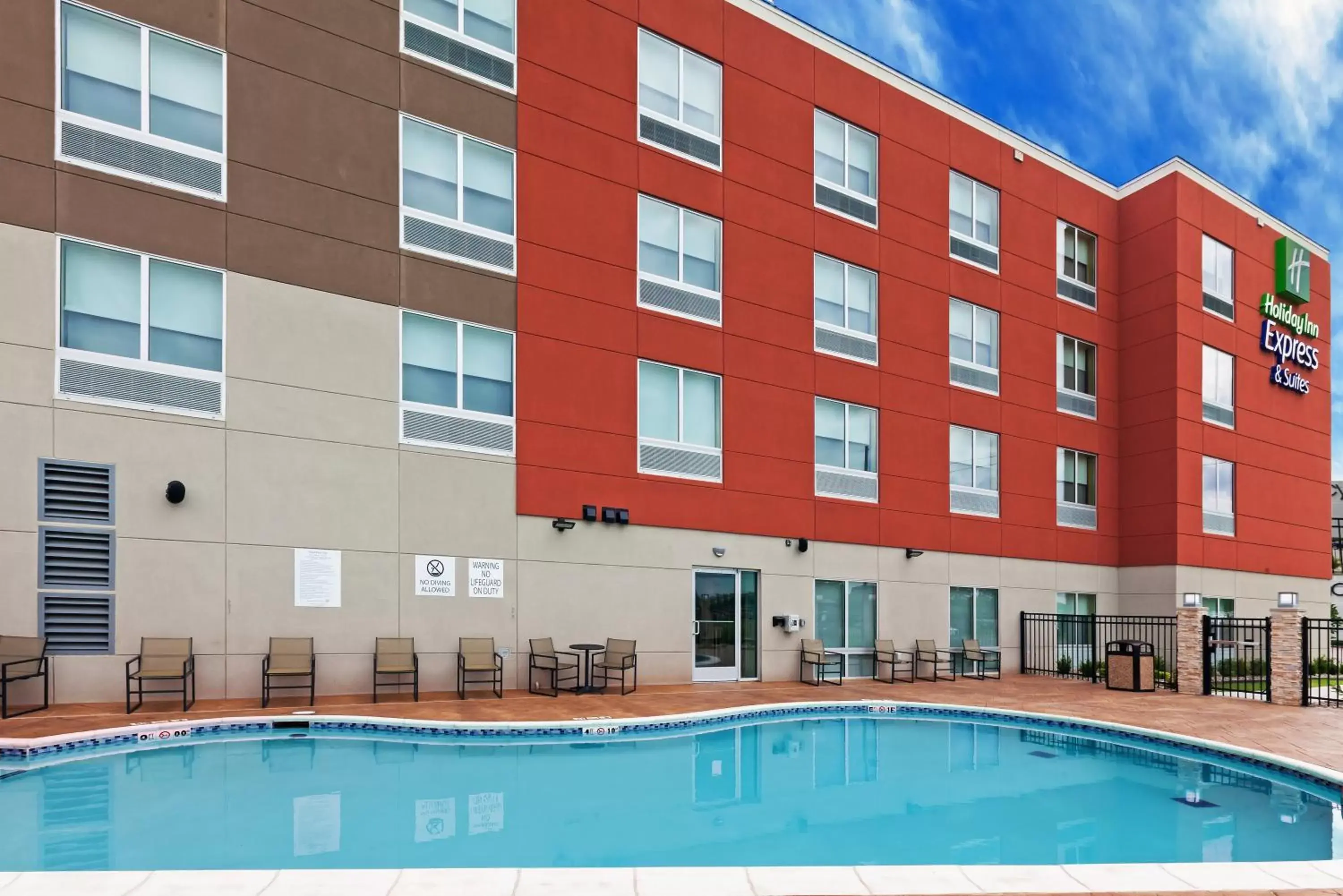 Swimming pool, Property Building in Holiday Inn Express & Suites Tulsa South - Woodland Hills, an IHG Hotel