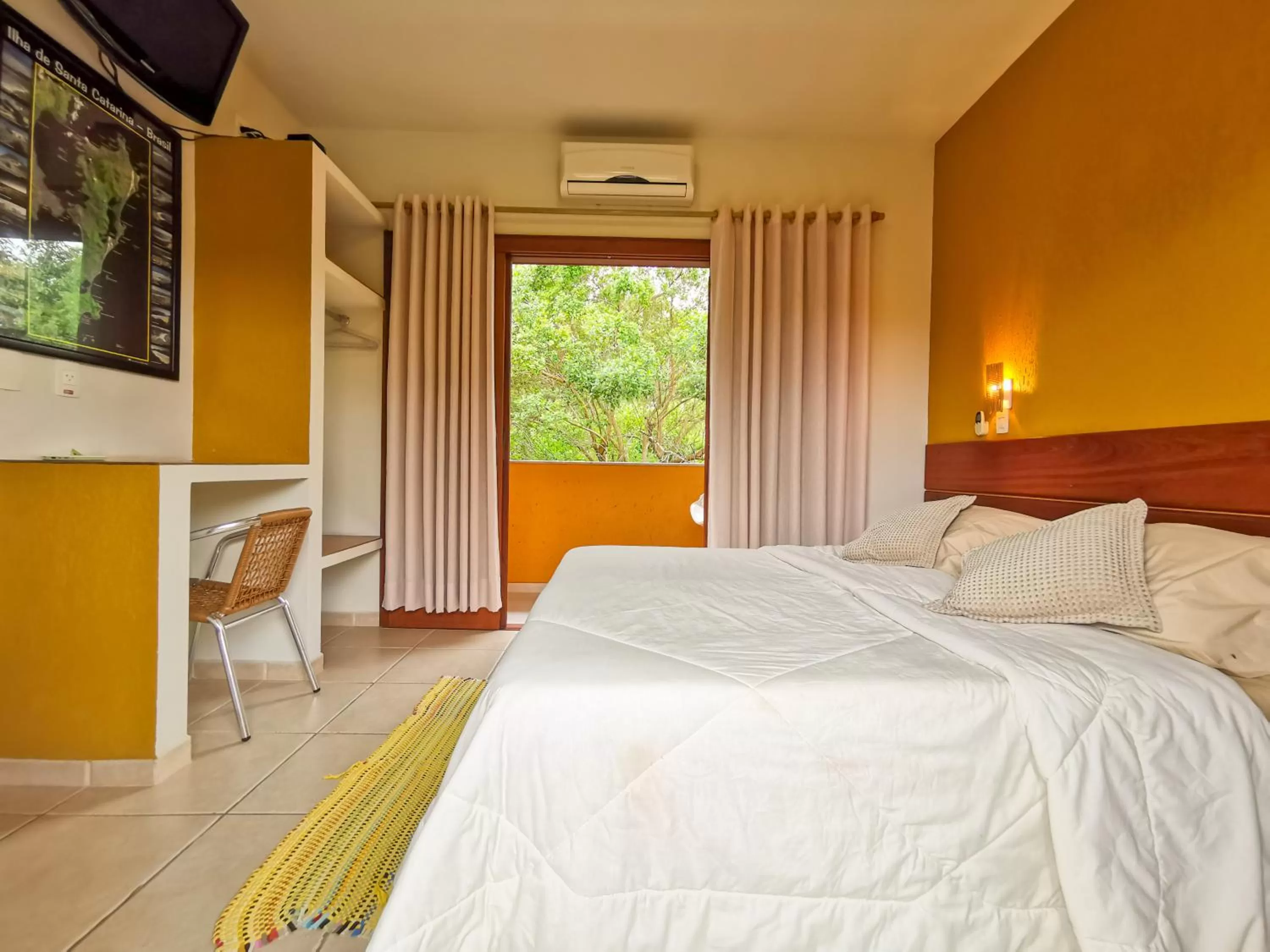 Bed in Pousada Ilha dos Anjos