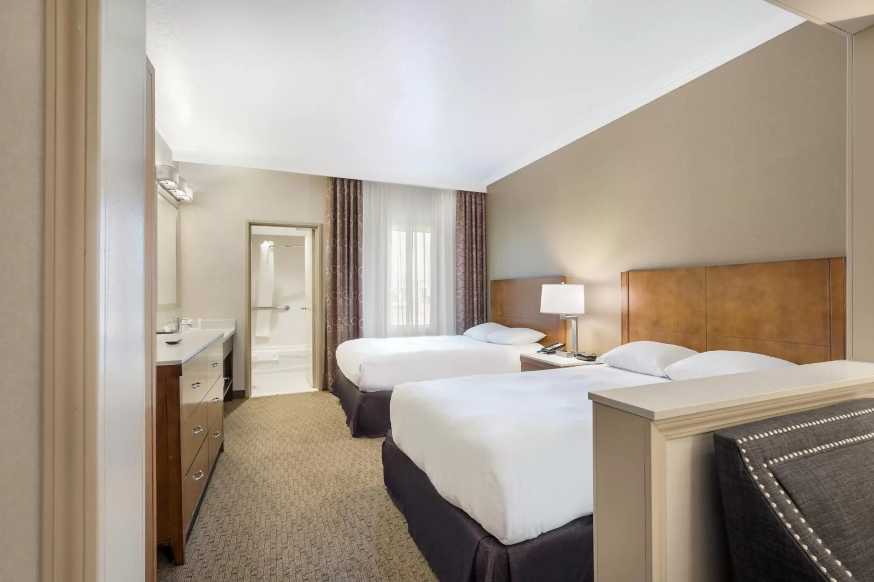 Bed in MainStay Suites John Wayne Airport, a Choice Hotel