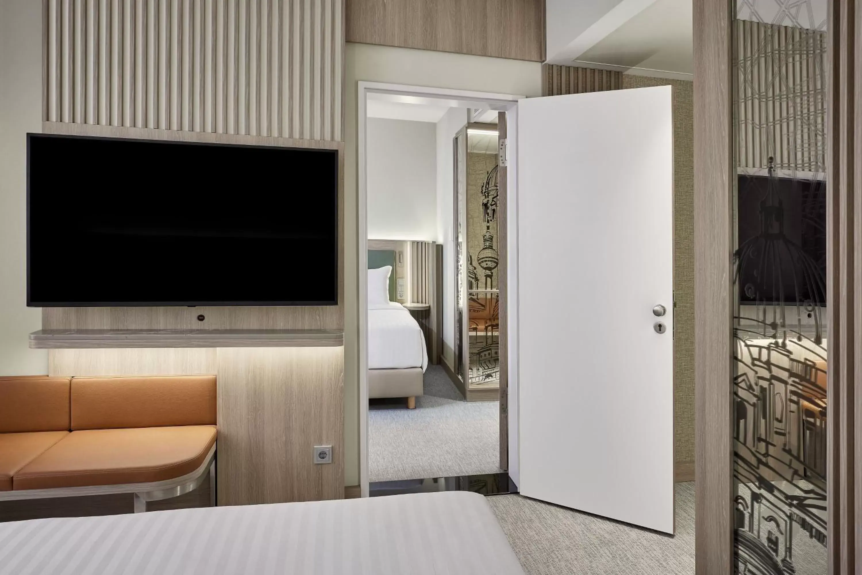 Photo of the whole room, TV/Entertainment Center in Courtyard by Marriott Berlin City Center