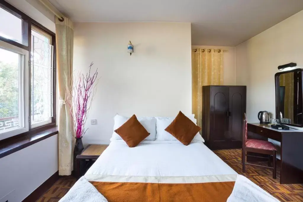 Bed in KATHMANDU NOMAD HOTEL