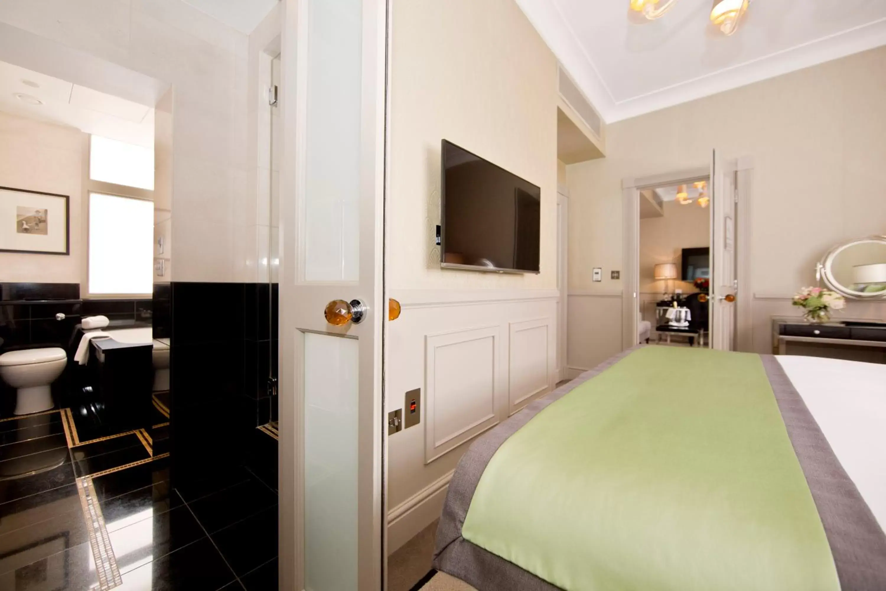 Bedroom, TV/Entertainment Center in St James Hotel & Club Mayfair