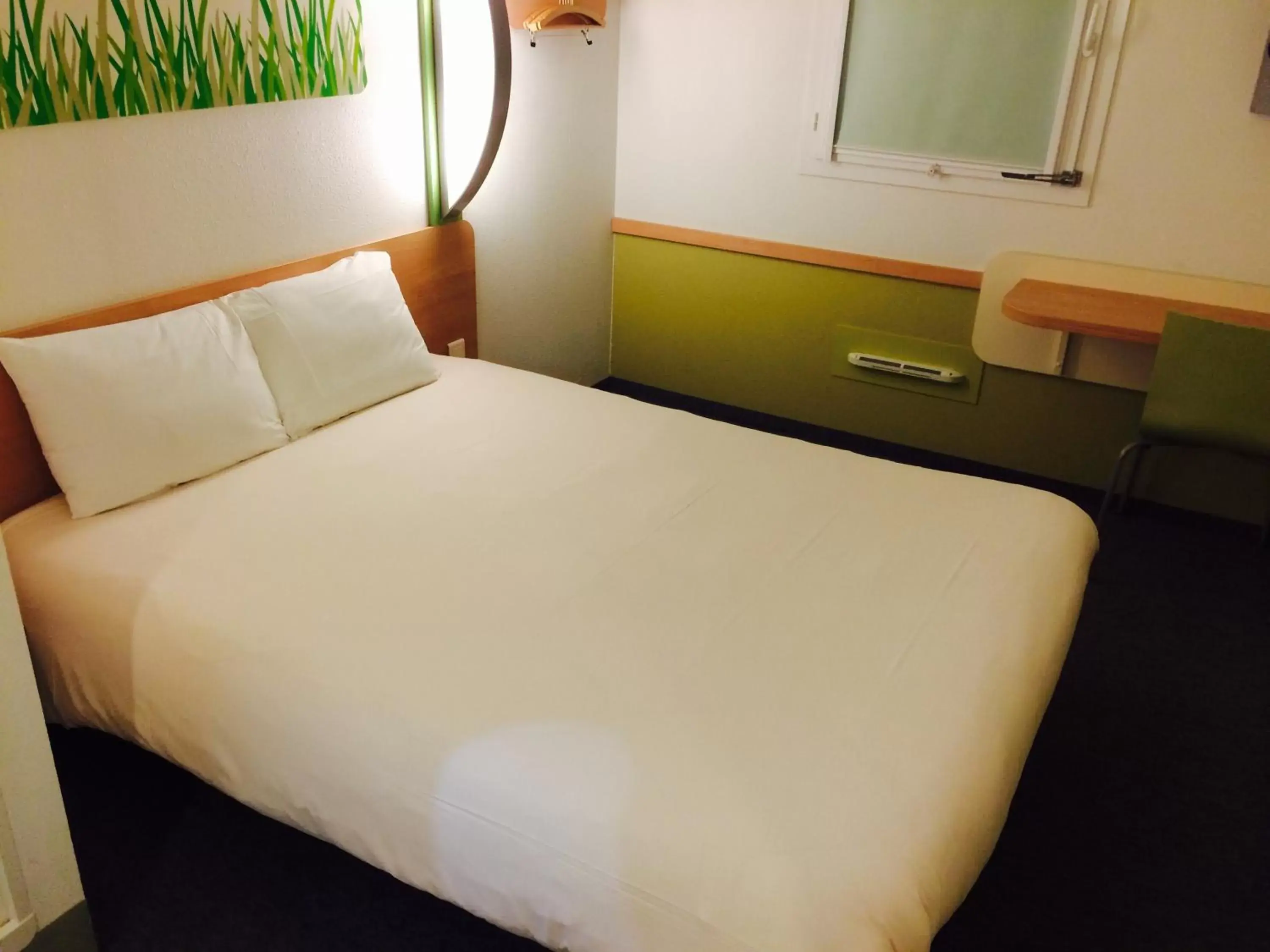 Bed in Ibis Budget Ancenis