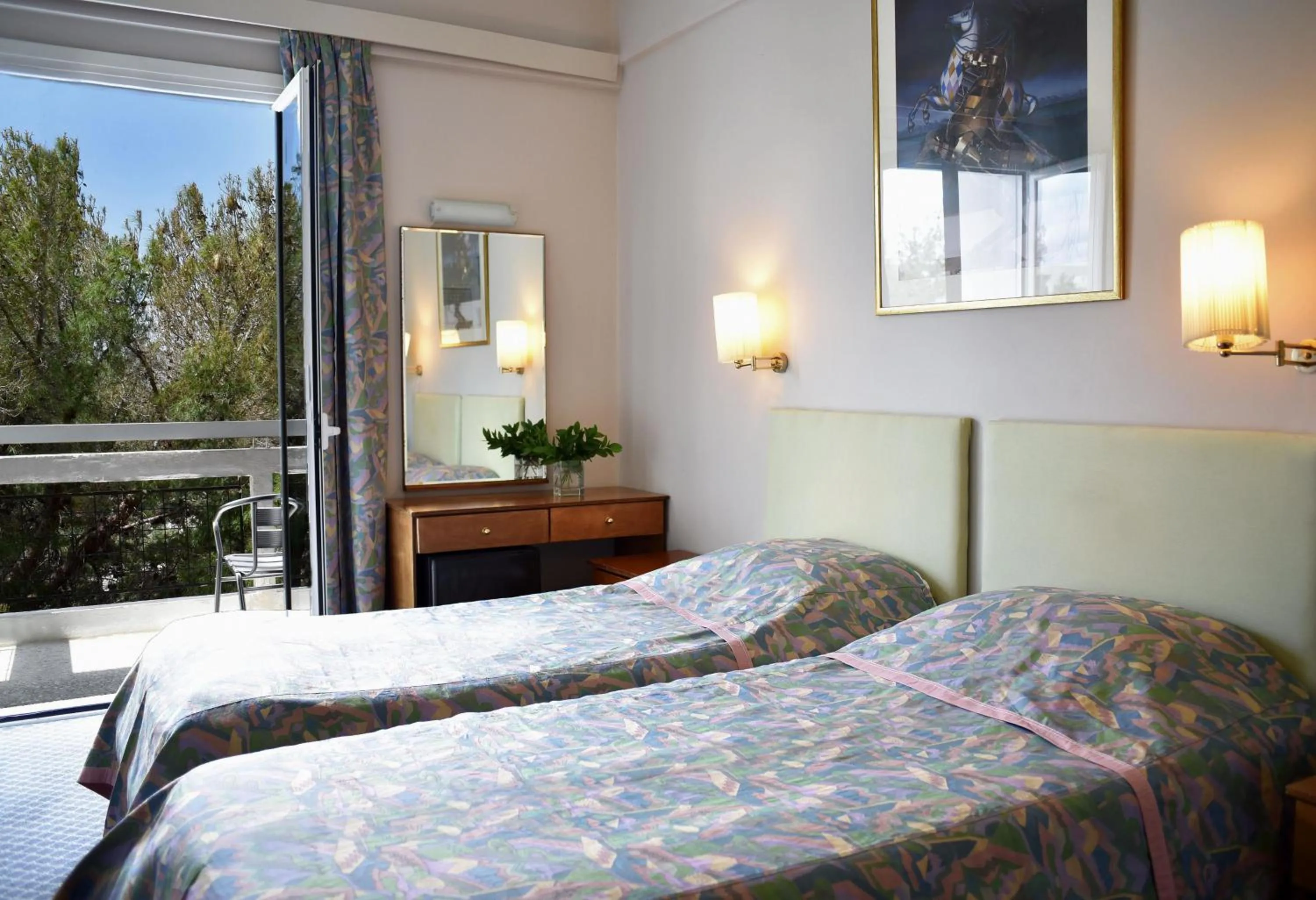 Bed in Karystion Hotel