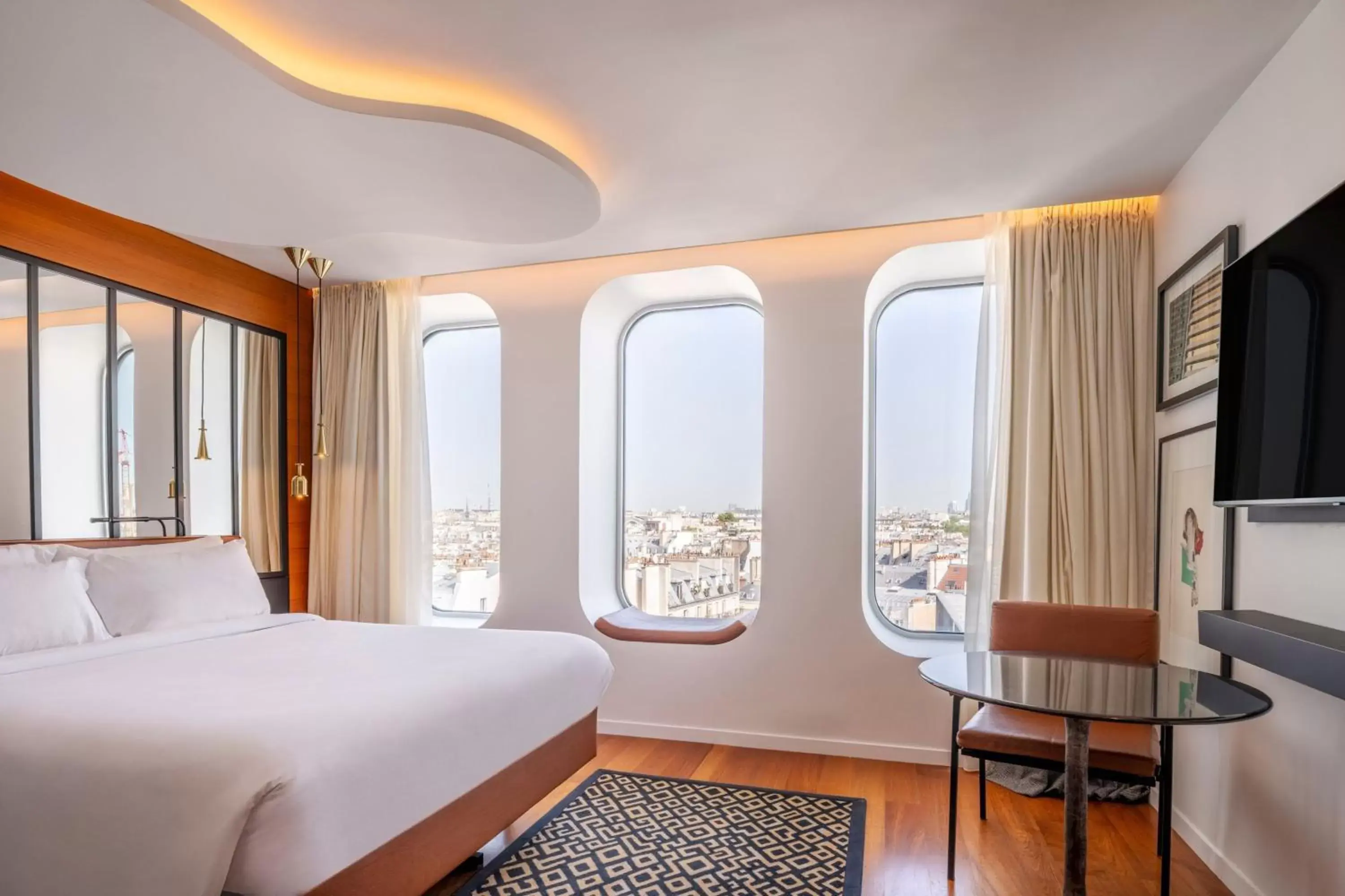 Photo of the whole room, Bed in Renaissance Paris Republique Hotel & Spa