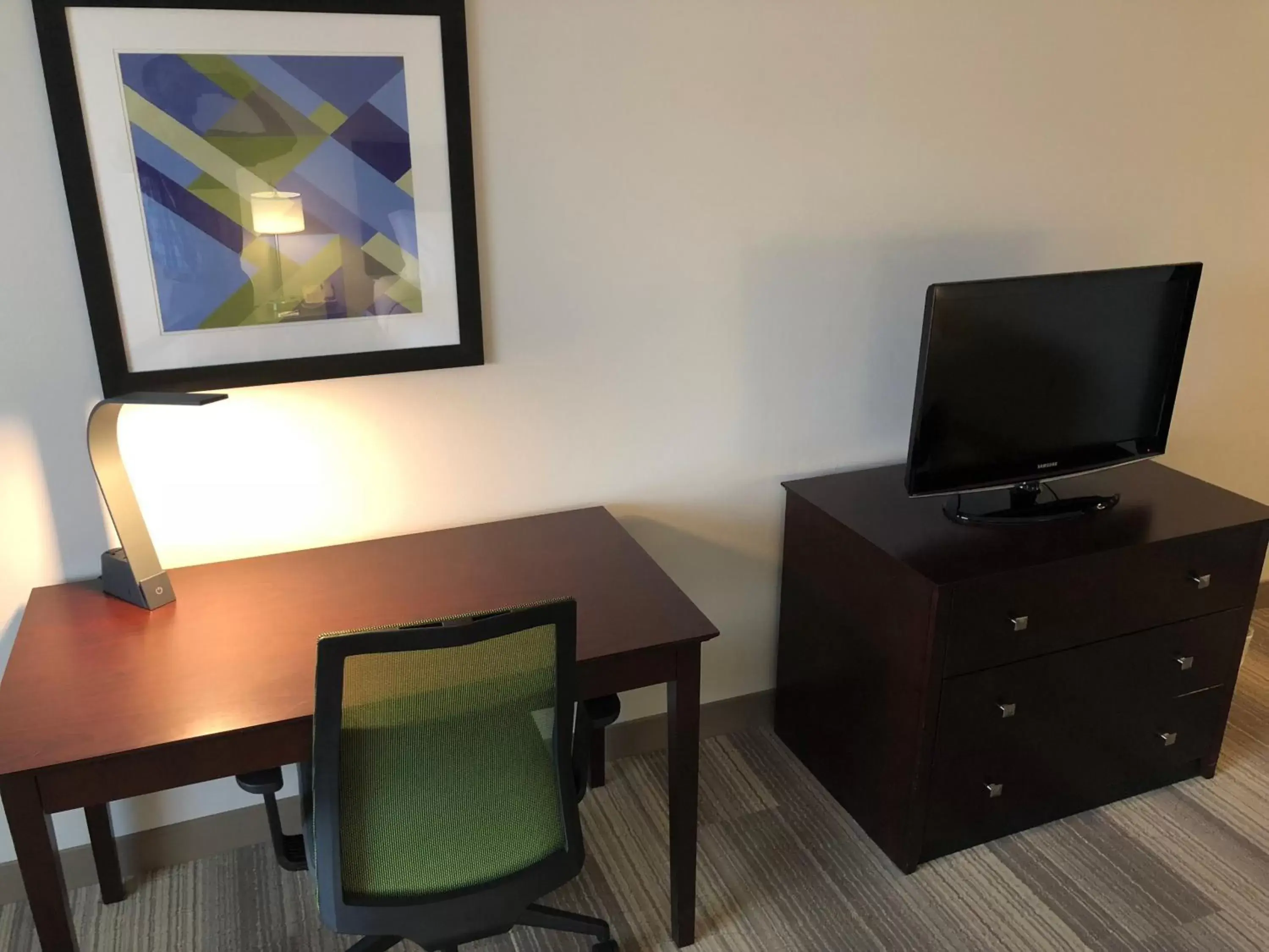 Photo of the whole room, TV/Entertainment Center in Holiday Inn Express Dayton, an IHG Hotel