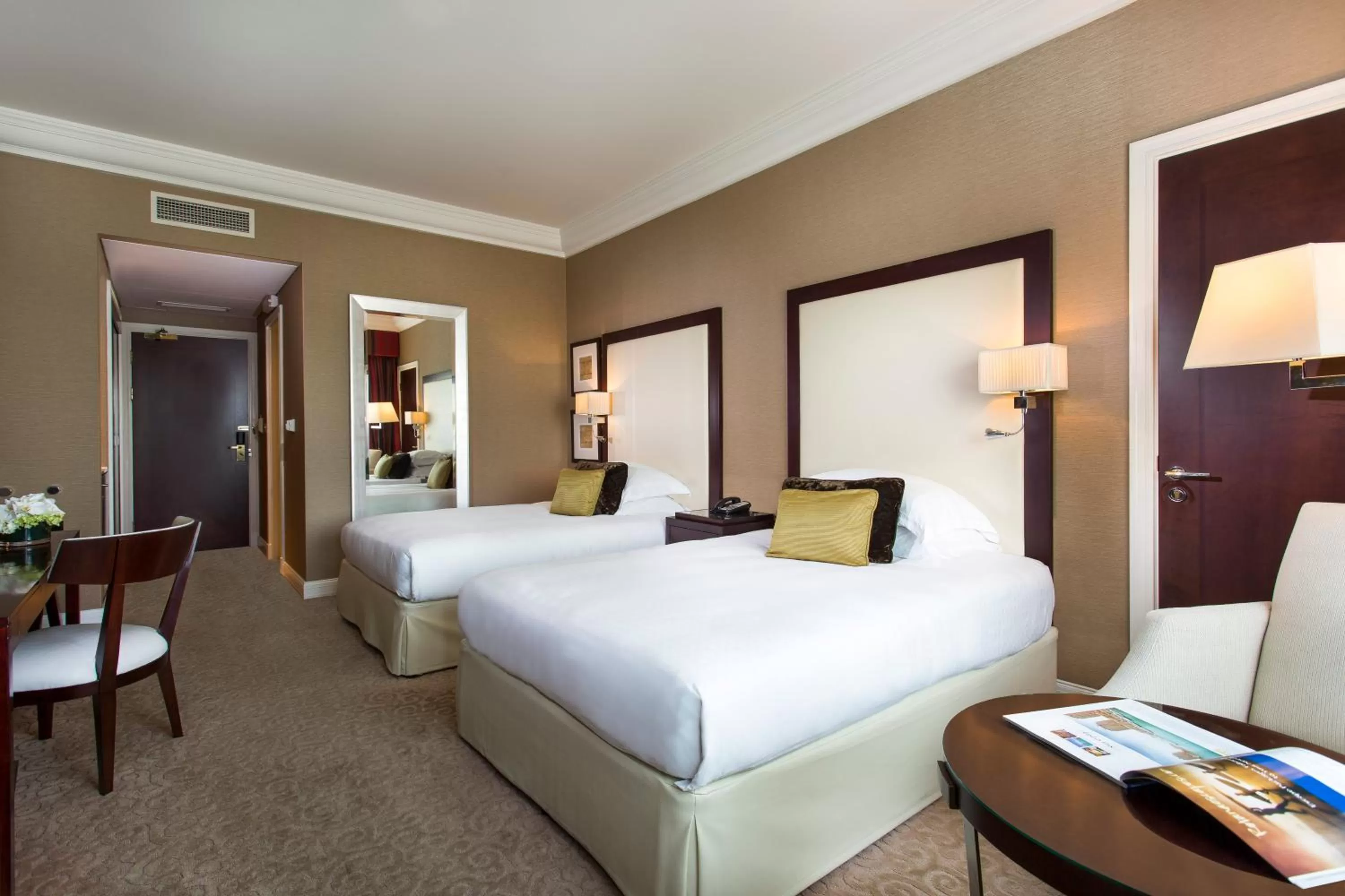 Bedroom, Bed in Mövenpick Grand Al Bustan