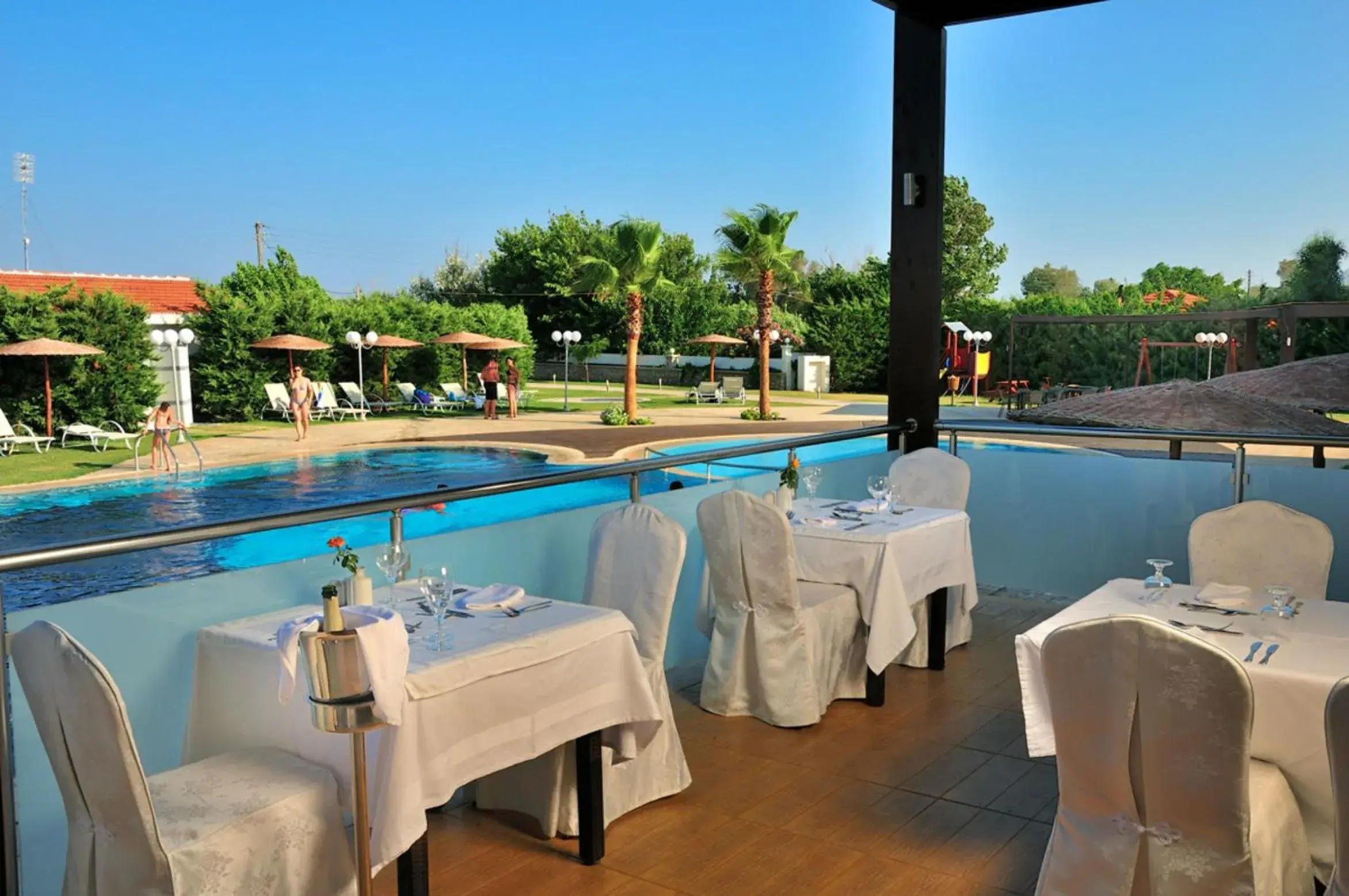 Restaurant/places to eat, Swimming Pool in Afandou Bay Resort Suites