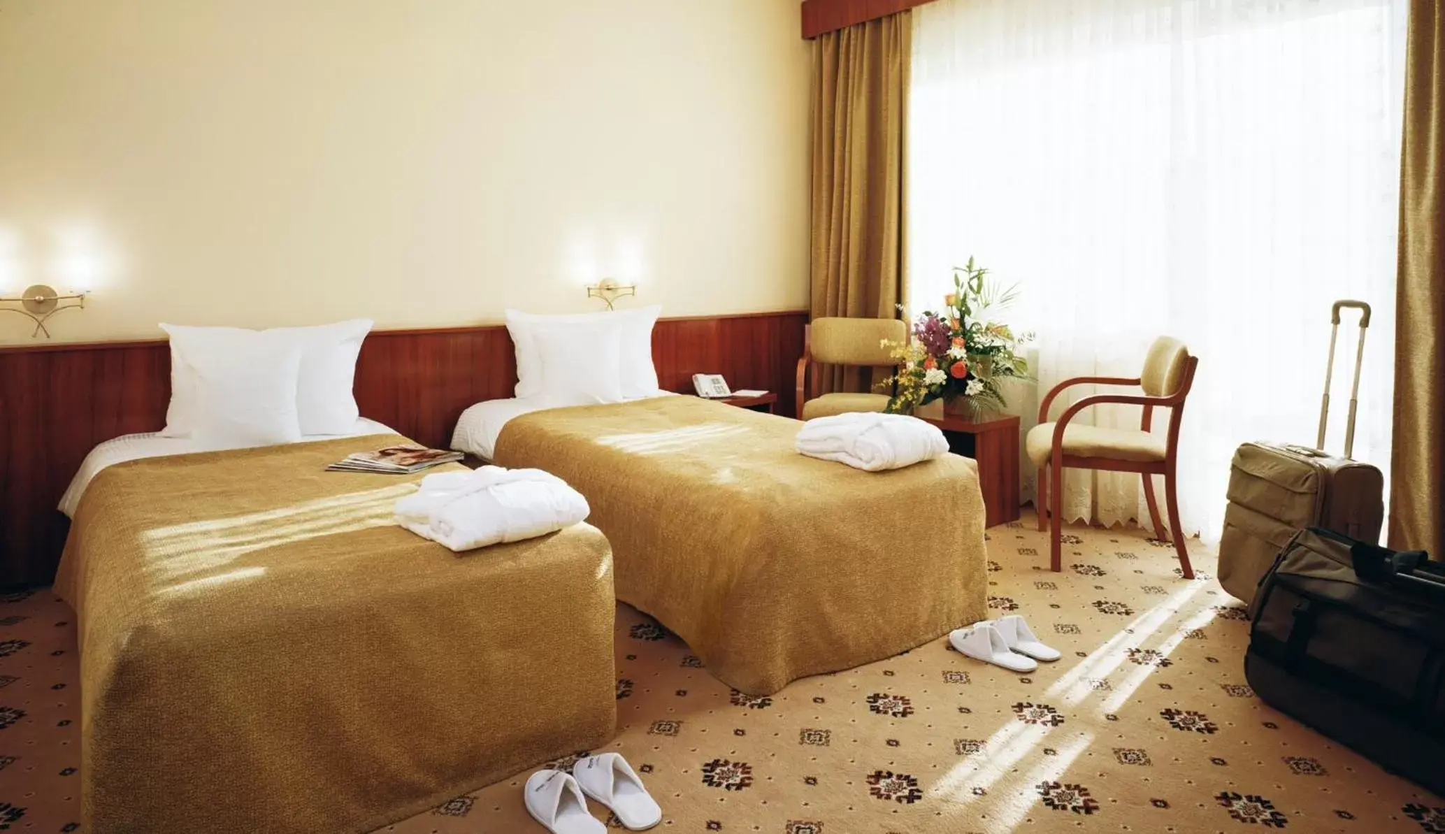 Bed in Caro Hotel