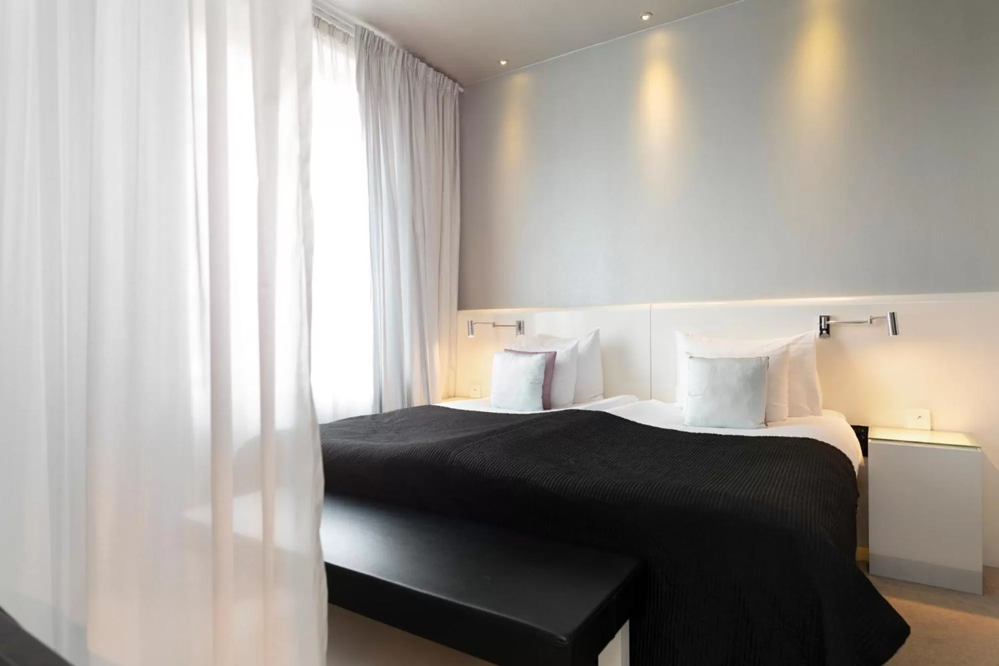 Bed in ProfilHotels Savoy