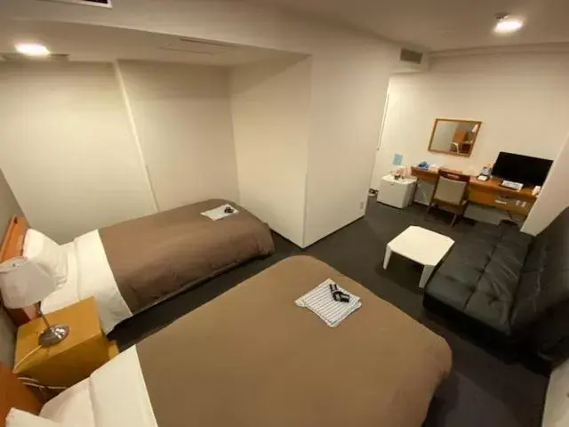 Bed in Hotel New Yutaka