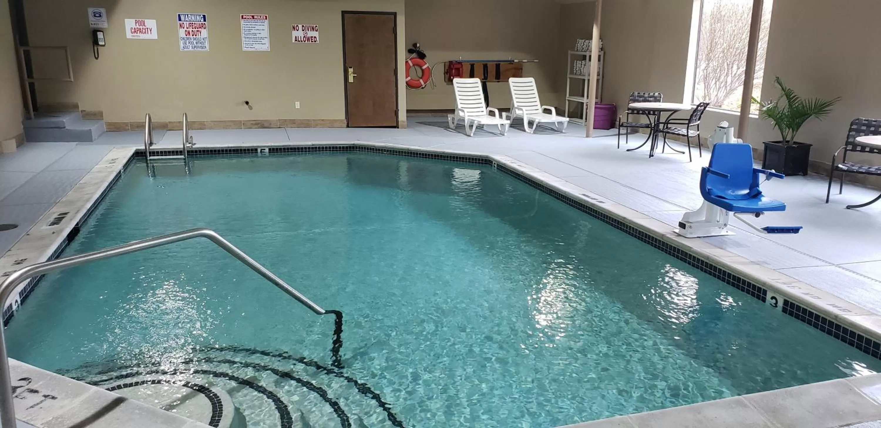 Swimming pool in Baymont by Wyndham Belleville Airport Area Free Airport Shuttle