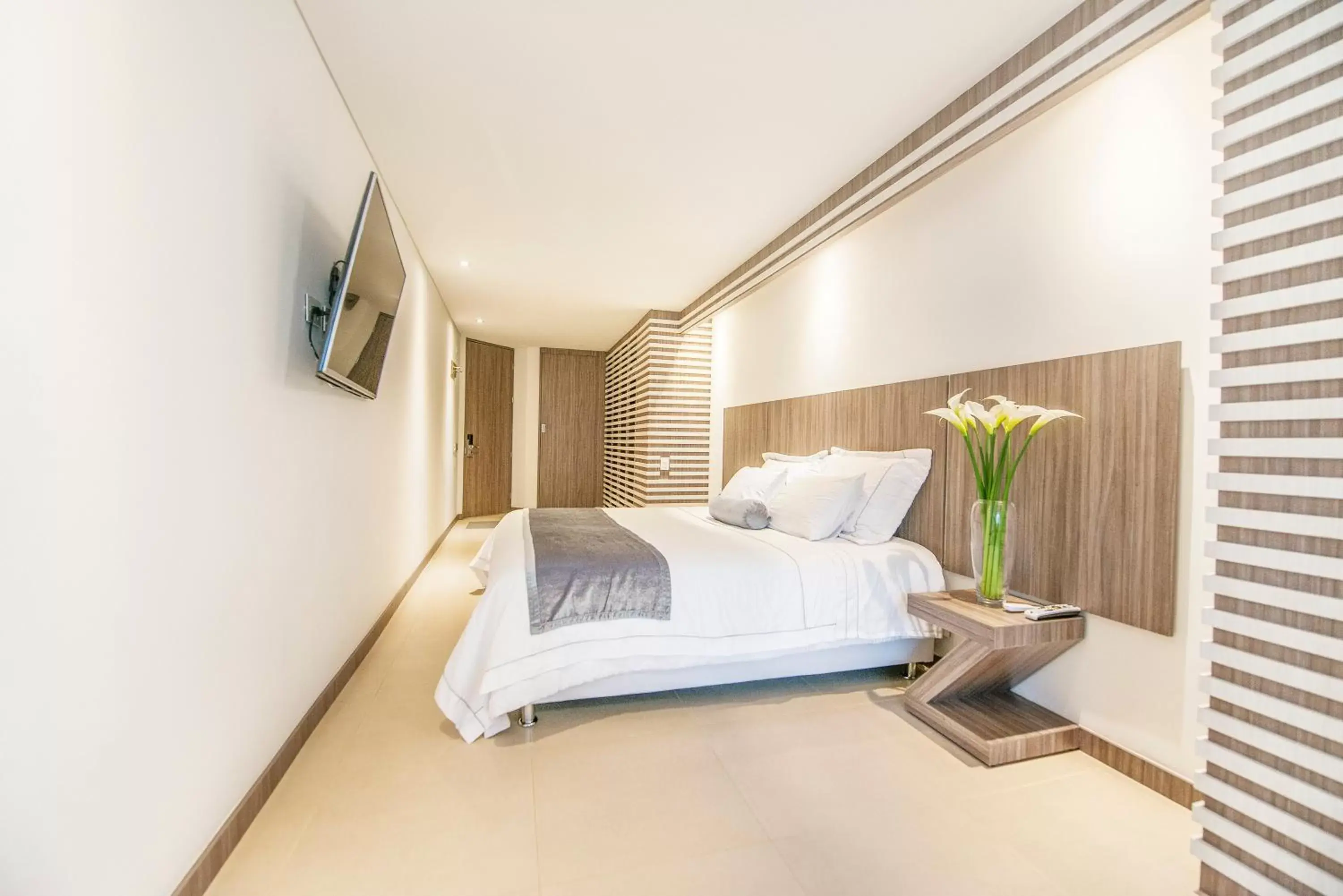 Bedroom, Bed in Hotel Torre Poblado Bedroom, Bed in Hotel Torre Poblado