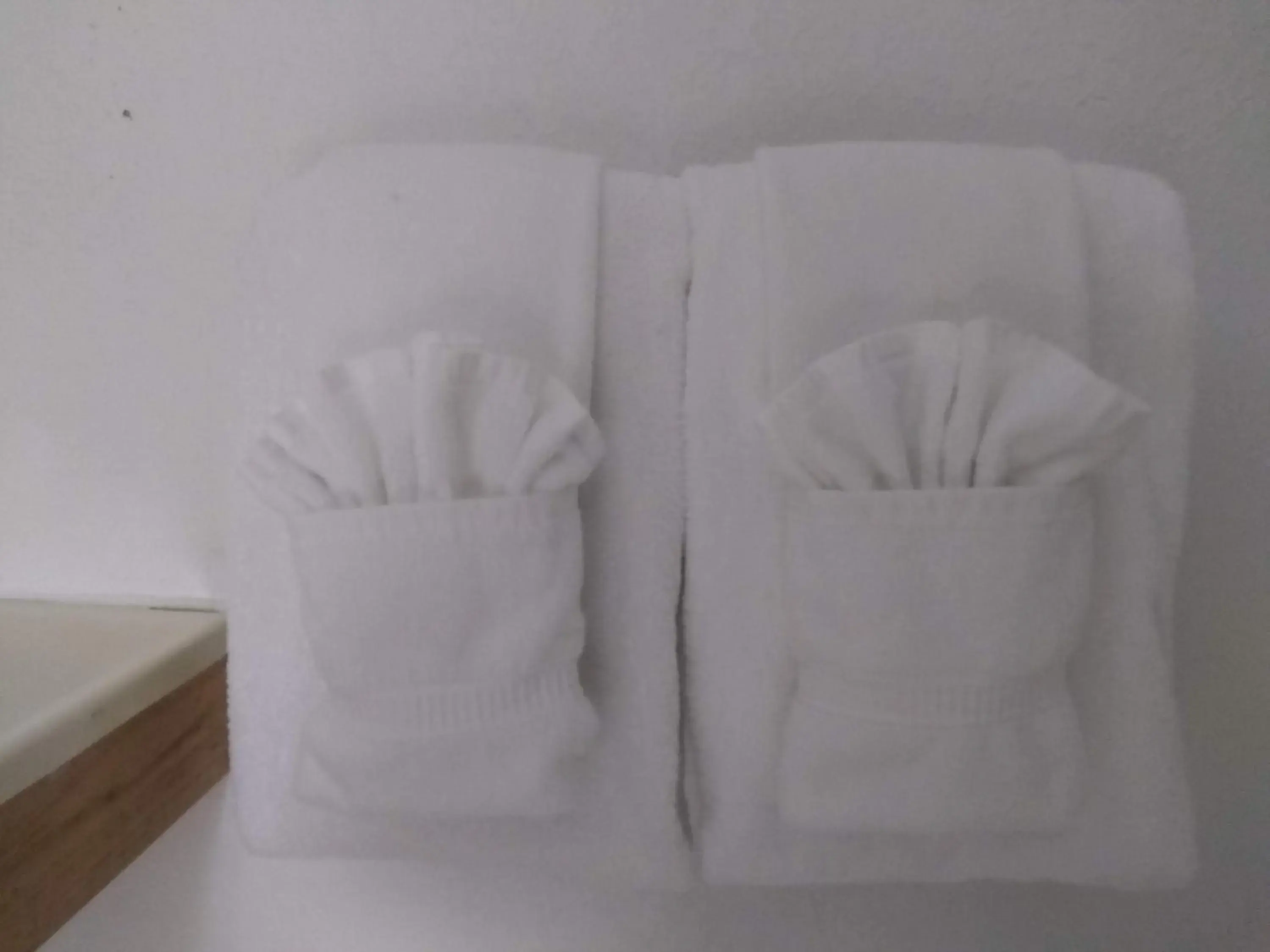 towels, Bed in The Orca Inn