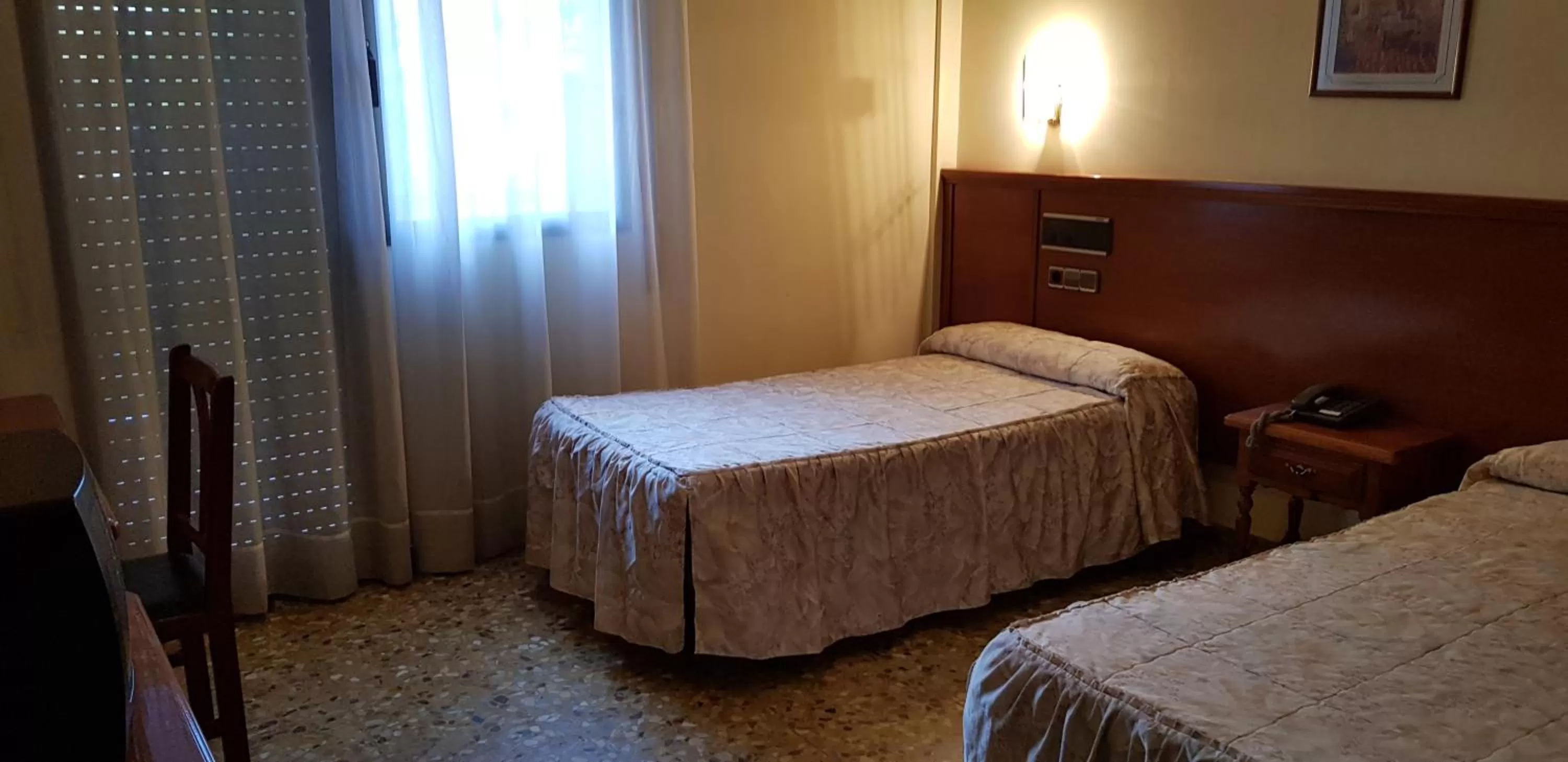 Bed in Hotel Reina Isabel