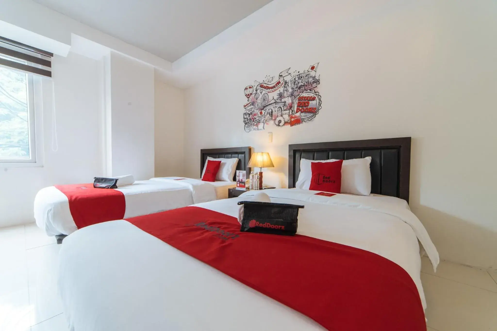 Bed in RedDoorz Plus at One Liberty Hotel Kalayaan Avenue