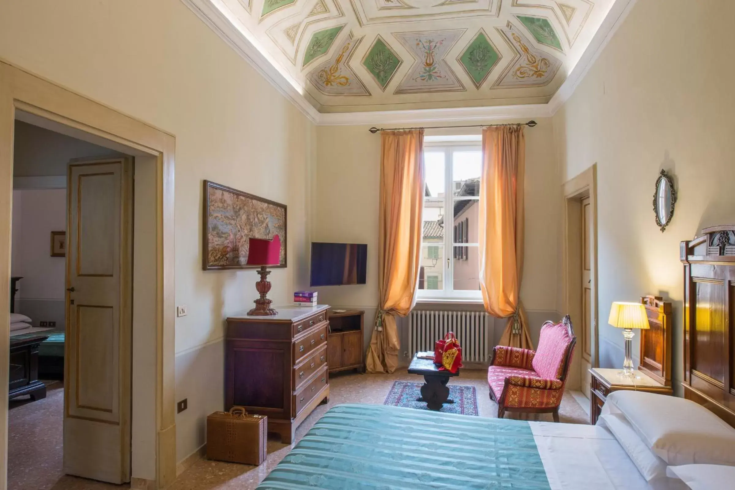 Bed, Seating Area in Palazzo Rotati