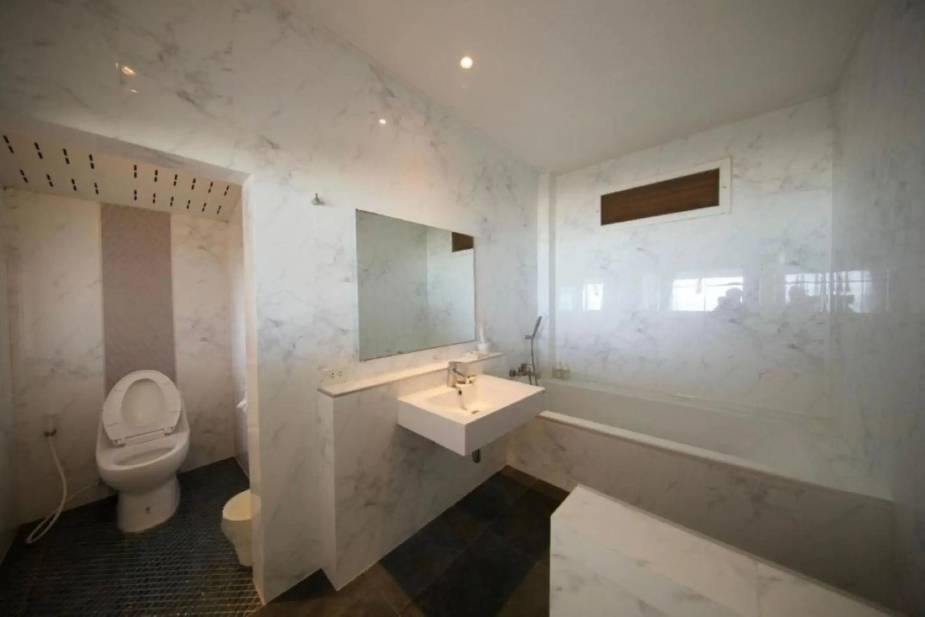 Bathroom in Twin Bay Resort - SHA Extra Plus