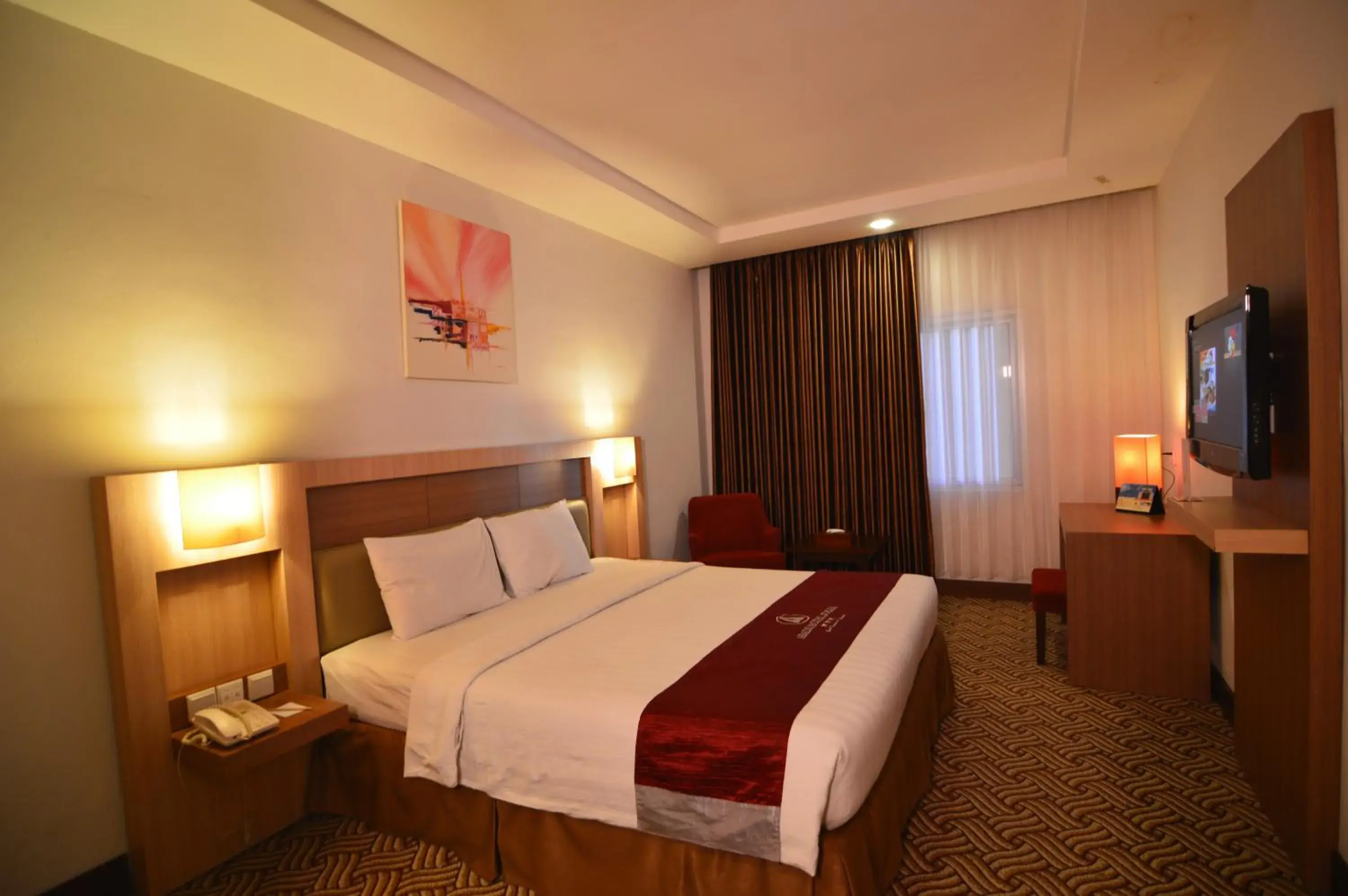 Bed in Abadi Hotel Malioboro Yogyakarta by Tritama Hospitality