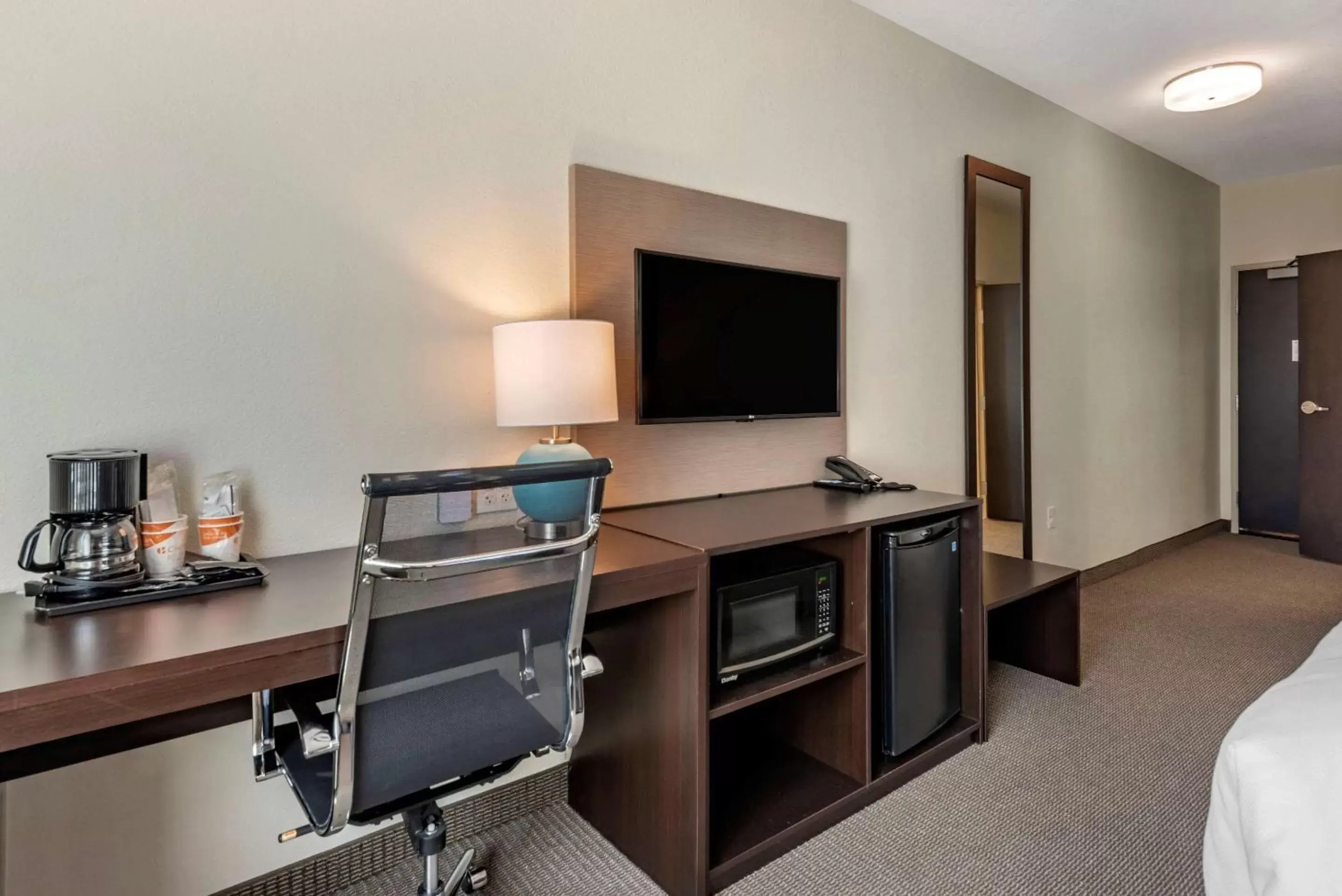 Photo of the whole room, TV/Entertainment Center in Sleep Inn Durango