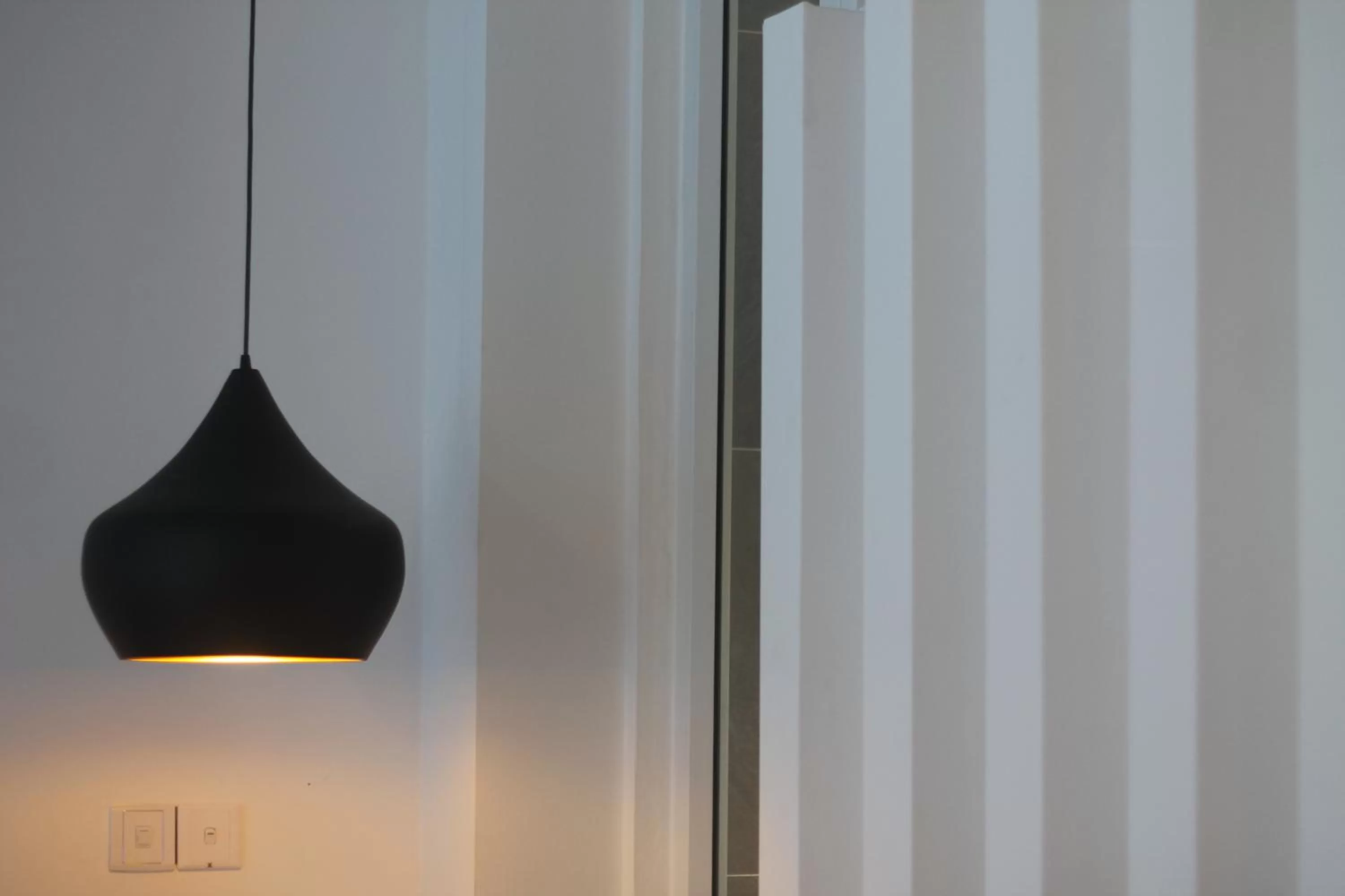 Bedroom in Benny's City Hotel