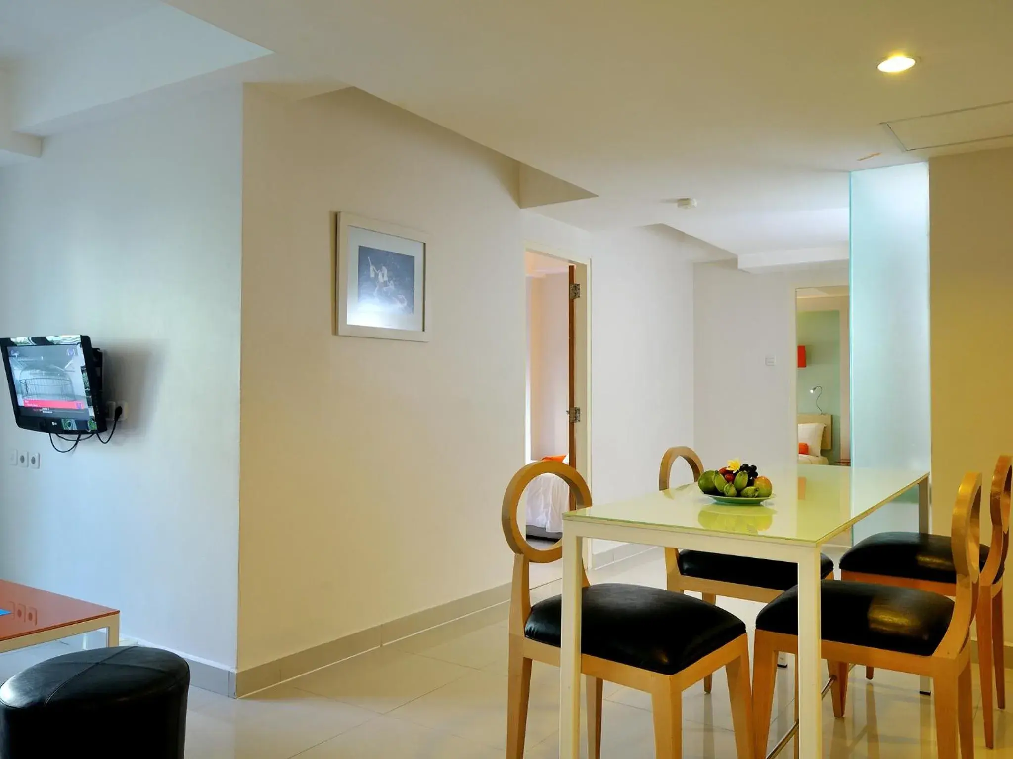 Living room, Dining Area in HOTEL and RESIDENCES Riverview Kuta - Bali (Associated HARRIS)