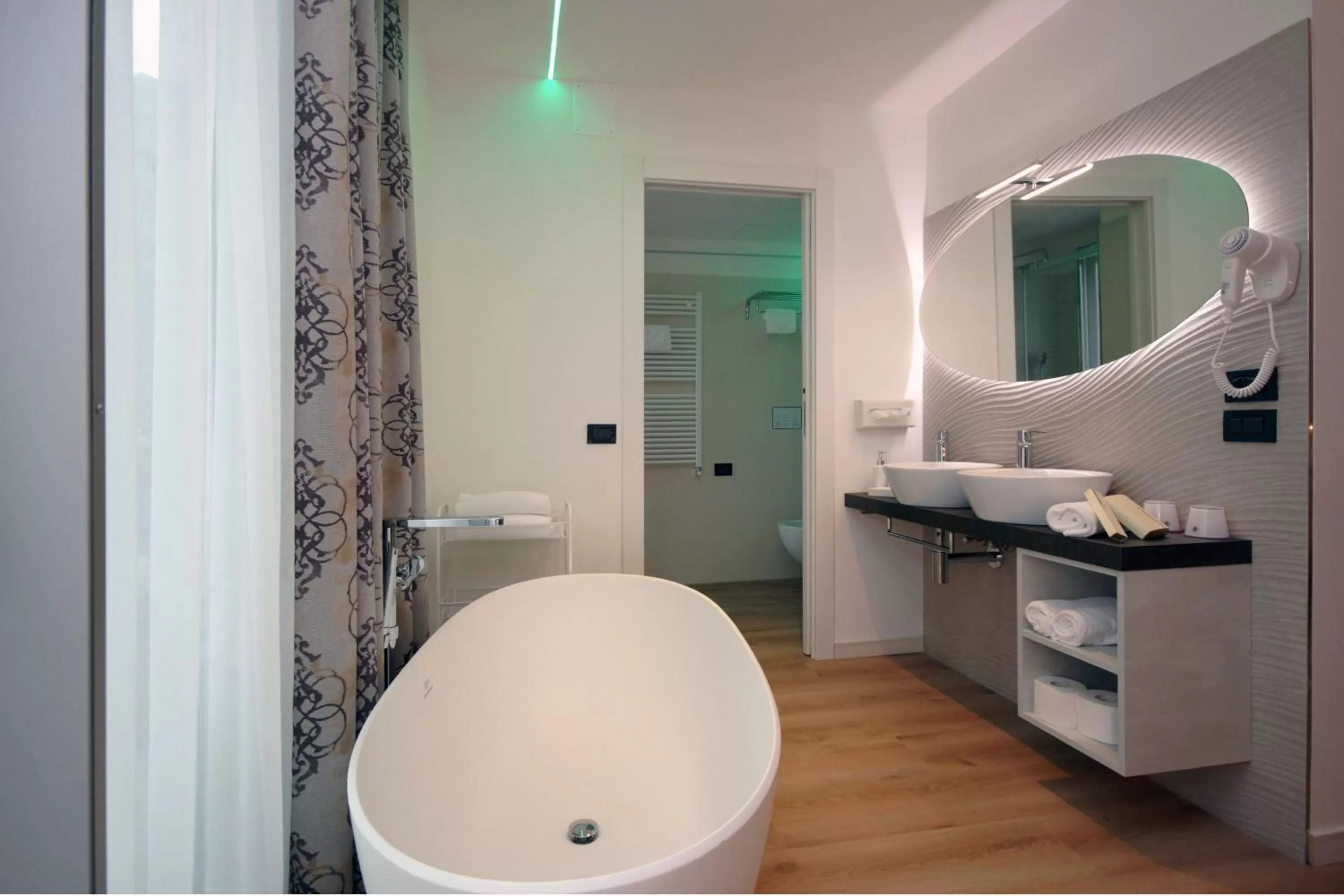 Bath in Ambassador Suite Hotel