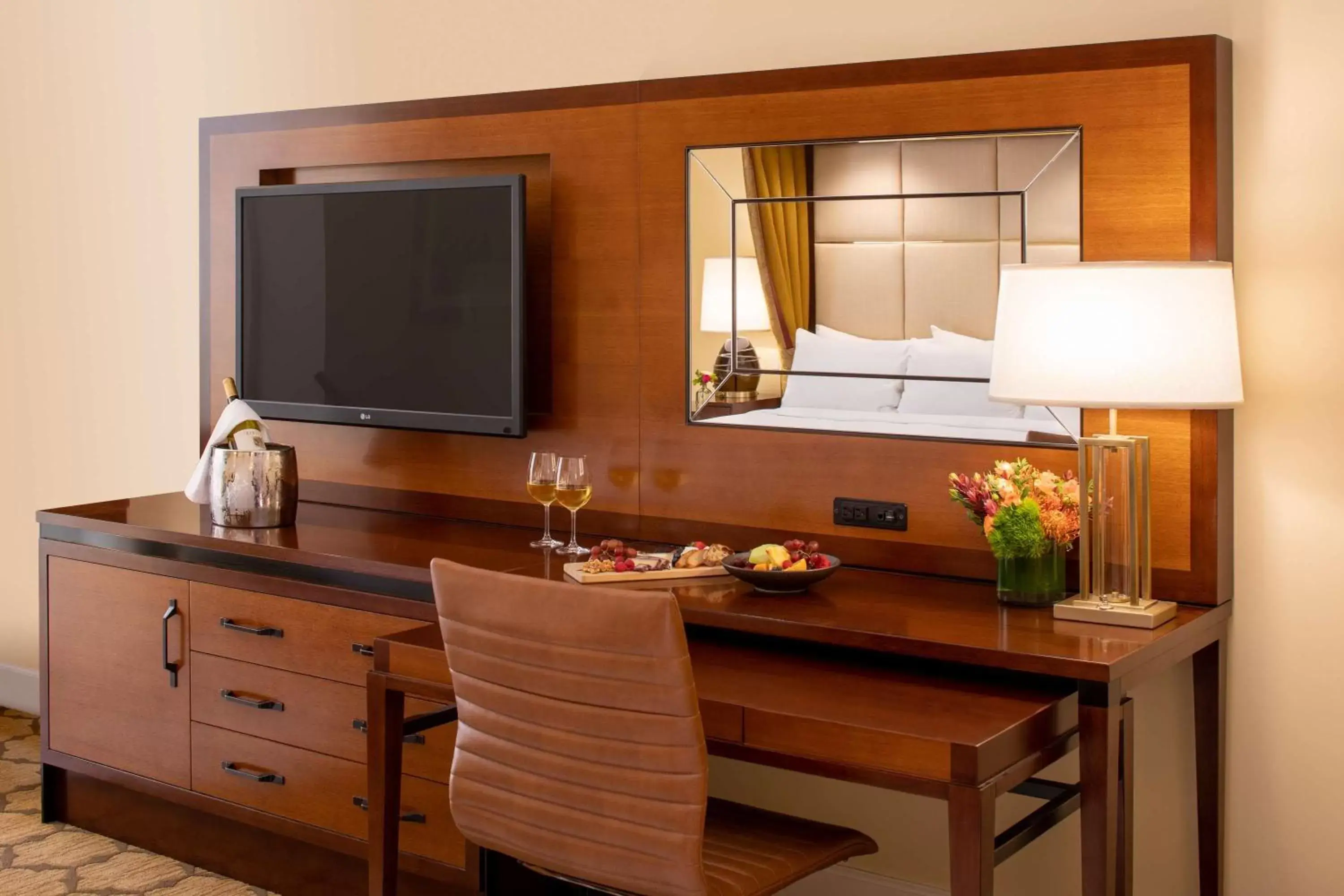 Bed, TV/Entertainment Center in The Meritage Resort and Spa