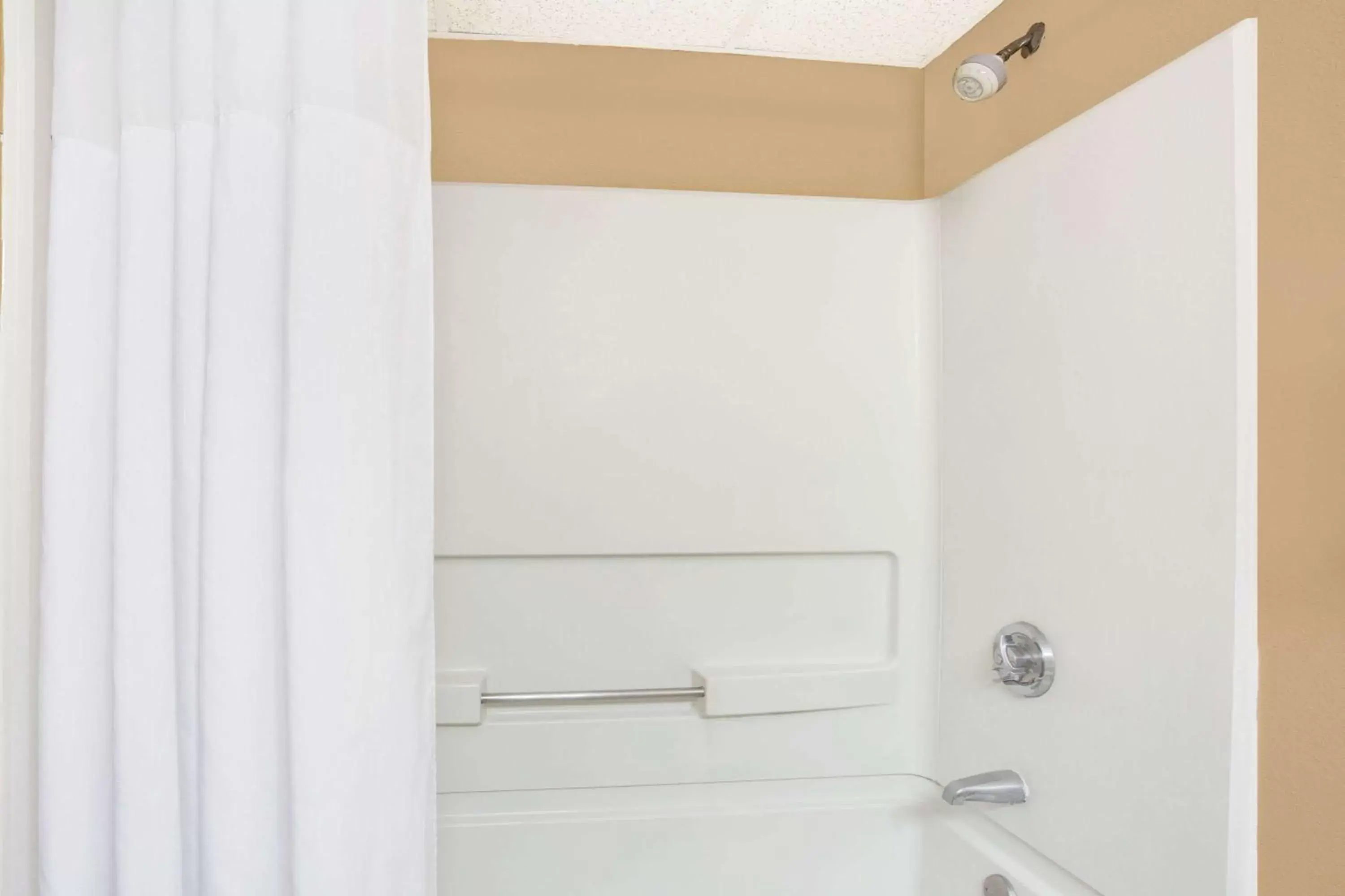 Bathroom in Days Inn by Wyndham Newport News City Center Oyster Point Bathroom in Days Inn by Wyndham Newport News City Center Oyster Point